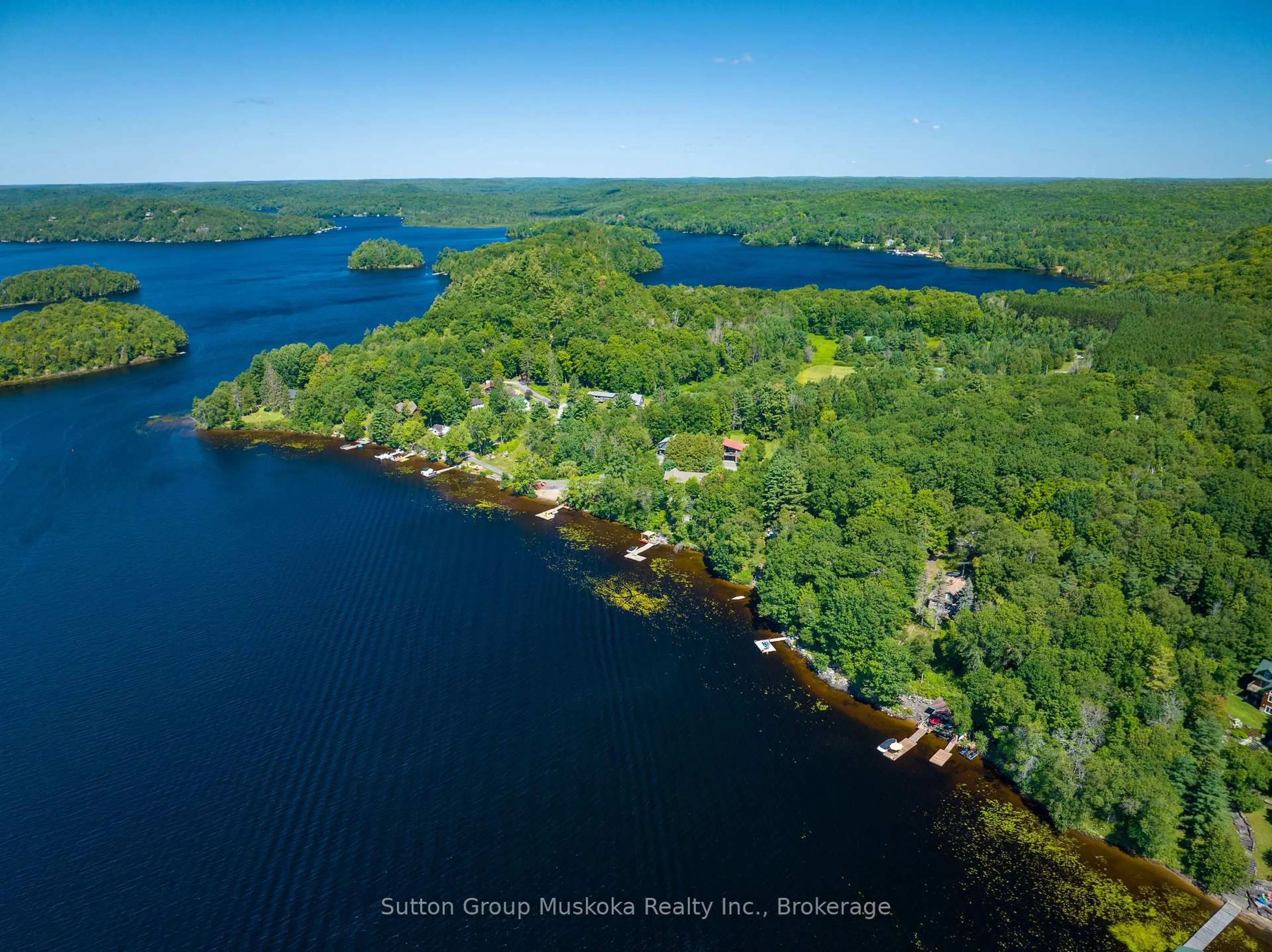 A pic from outside/outdoor area/front of a property/back of a property/a pic from drone, water/lake/river/ocean view for 29 Island View Lane, Huntsville Ontario P1H 2N5