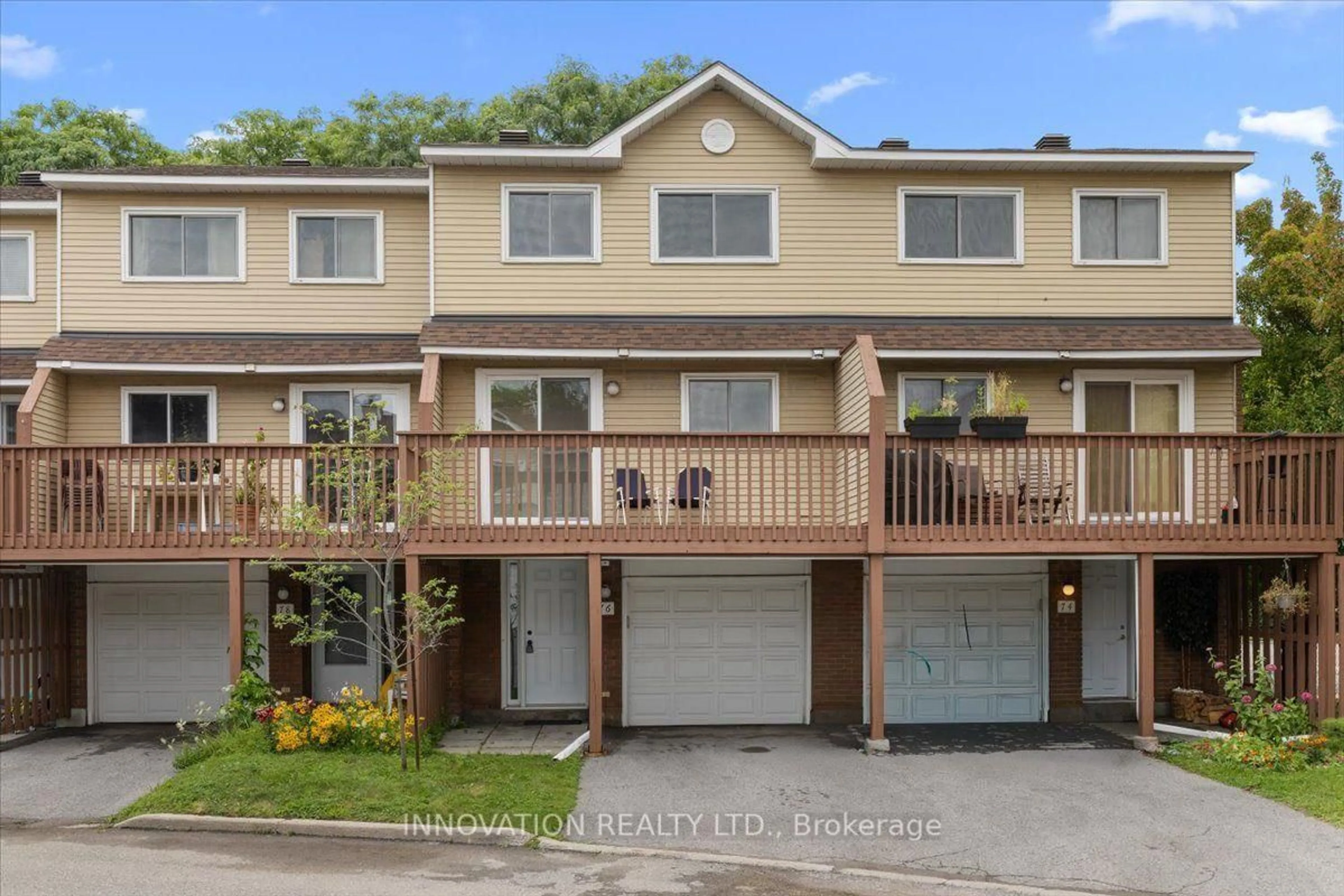 Home with vinyl exterior material, street for 76 Esterlawn Private #2, Ottawa Ontario K2A 4B9