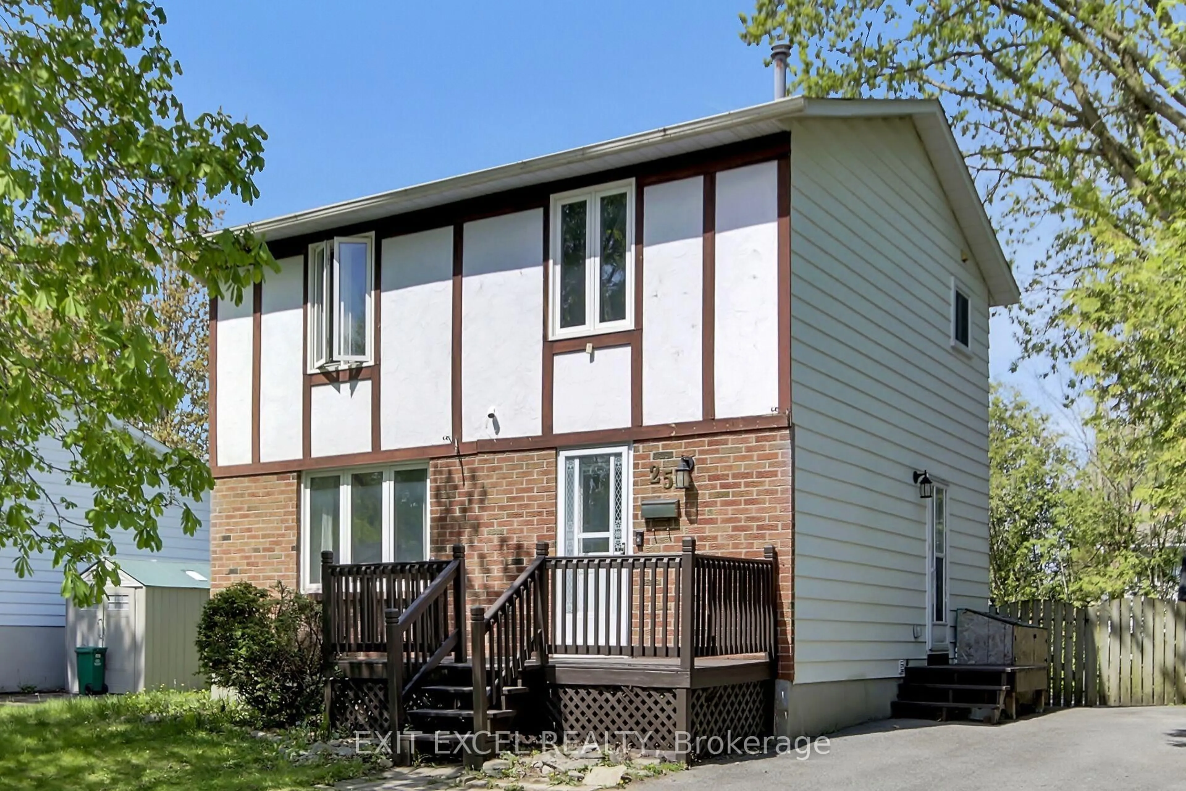 Home with vinyl exterior material, street for 25 Uxbridge Cres, Ottawa Ontario K2L 1P6
