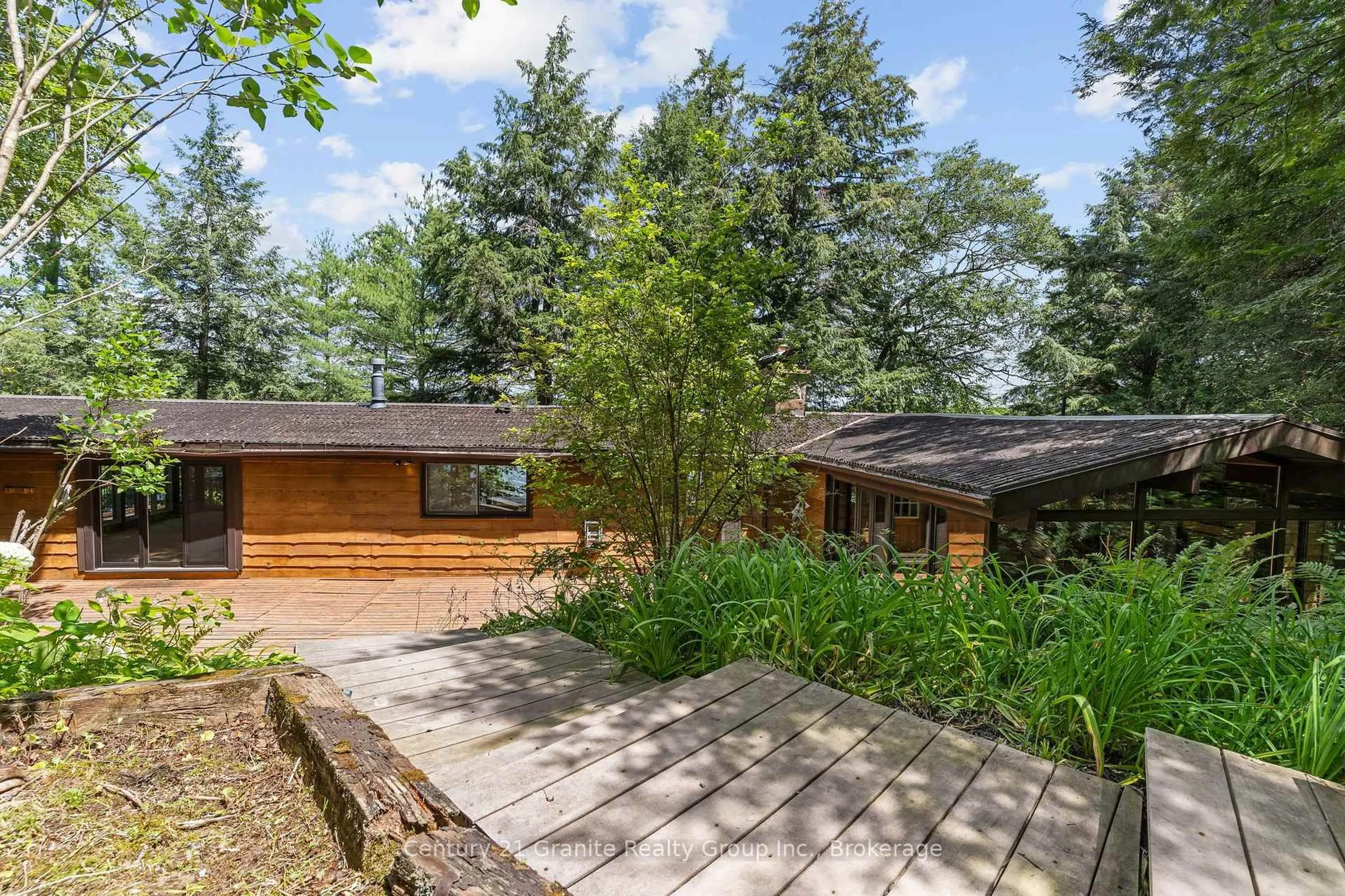 A pic from outside/outdoor area/front of a property/back of a property/a pic from drone, forest/trees view for 1427 Town Lot Rd, Algonquin Highlands Ontario K0M 1S0