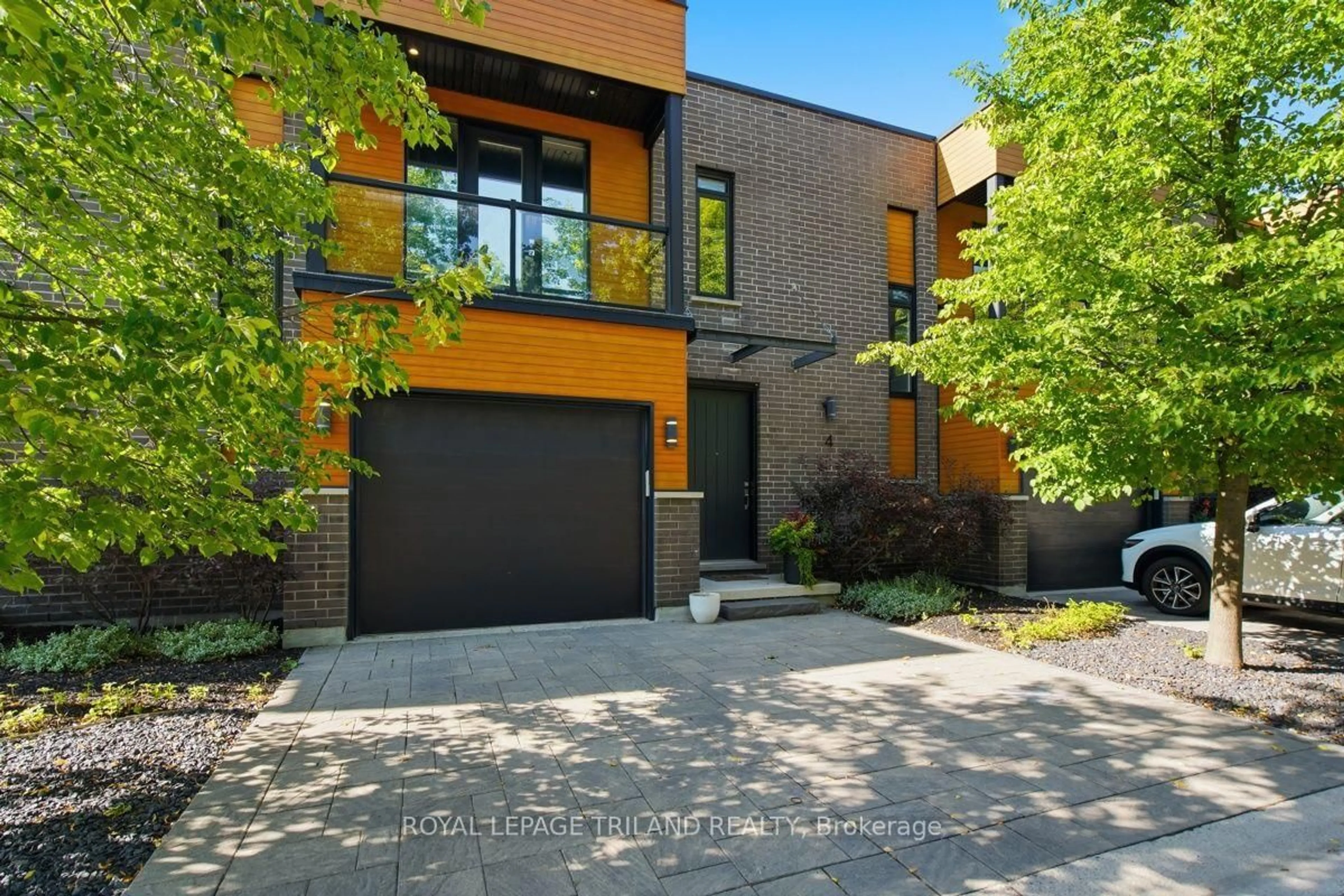 Home with brick exterior material, street for 433 Hyde Park Rd #4, London North Ontario N6H 0H5