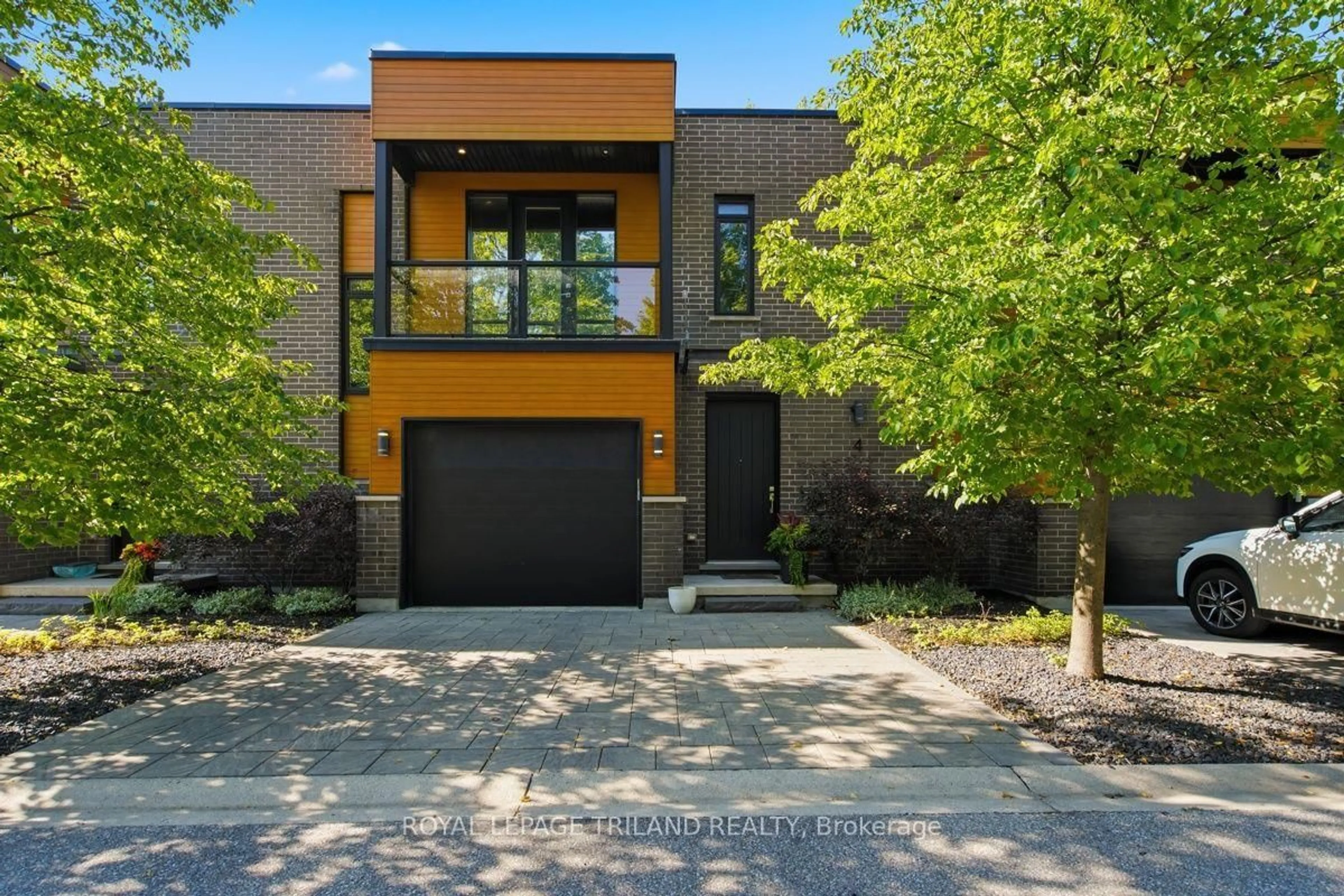 Home with brick exterior material, street for 433 Hyde Park Rd #4, London North Ontario N6H 0H5