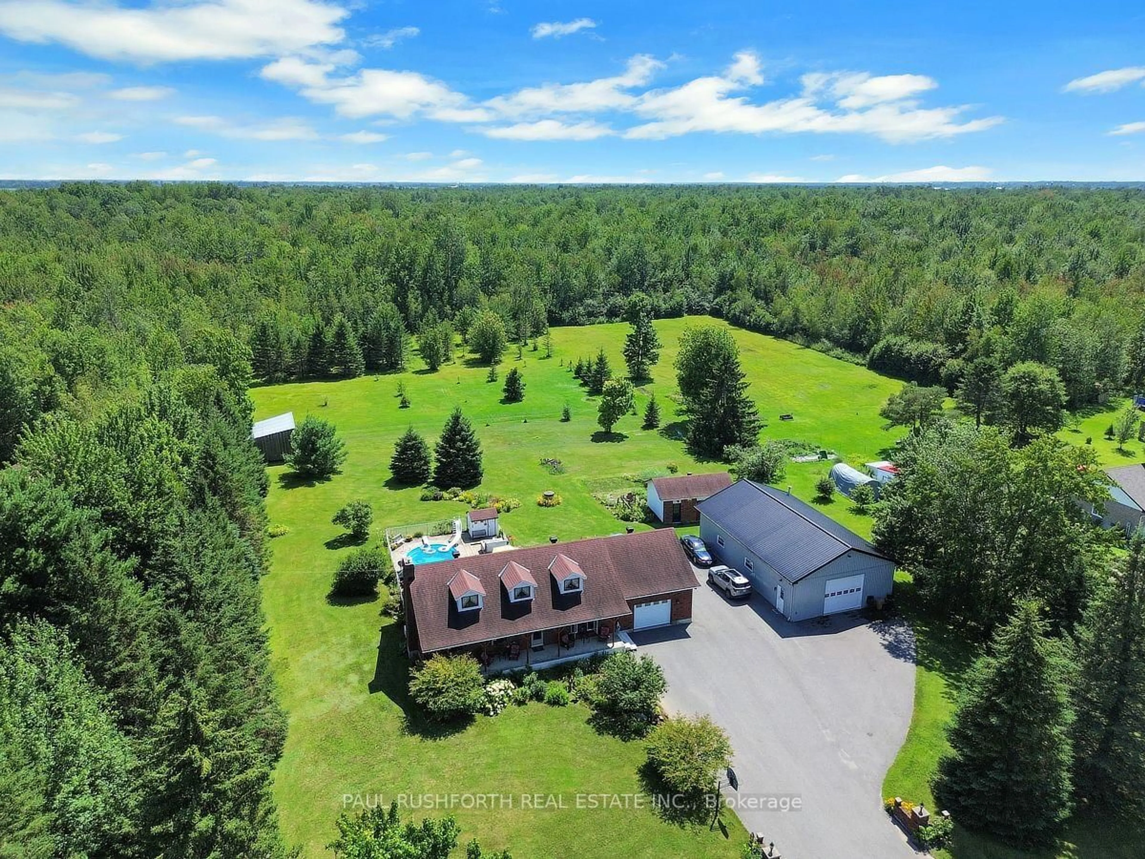 A pic from outside/outdoor area/front of a property/back of a property/a pic from drone, forest/trees view for 2362 Russland Rd, Russell Ontario K0A 3H0