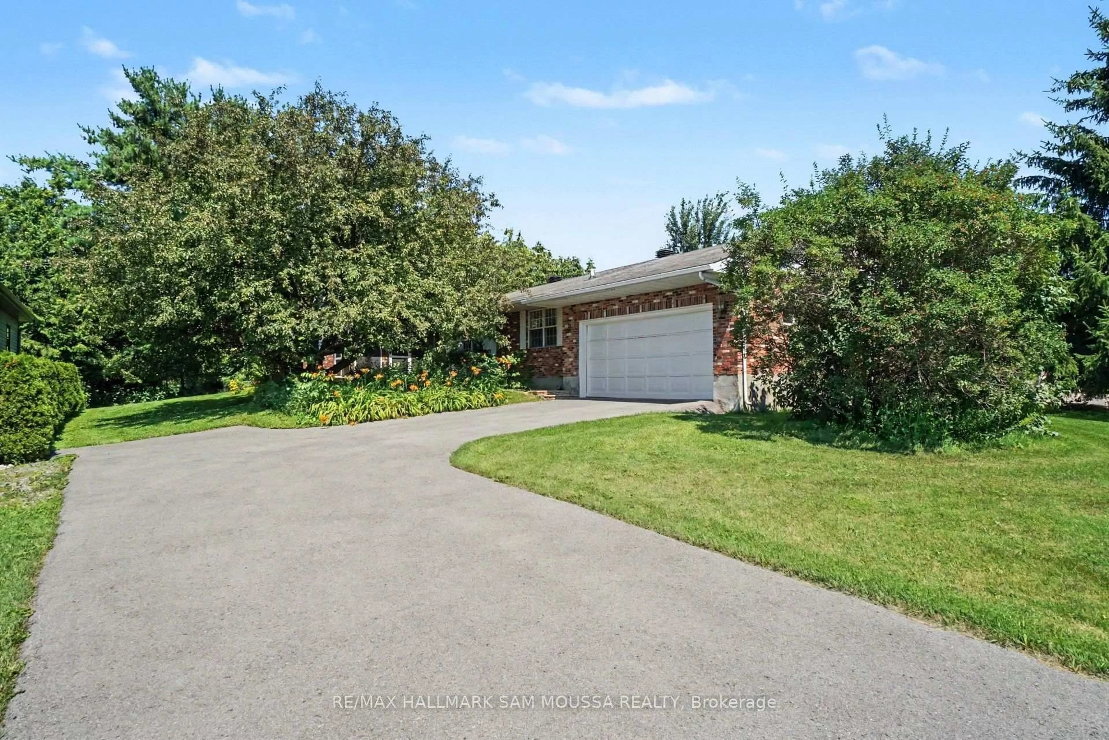 A pic from outside/outdoor area/front of a property/back of a property/a pic from drone, water/lake/river/ocean view for 118 Juanita Ave, Carp Ontario K0A 1L0