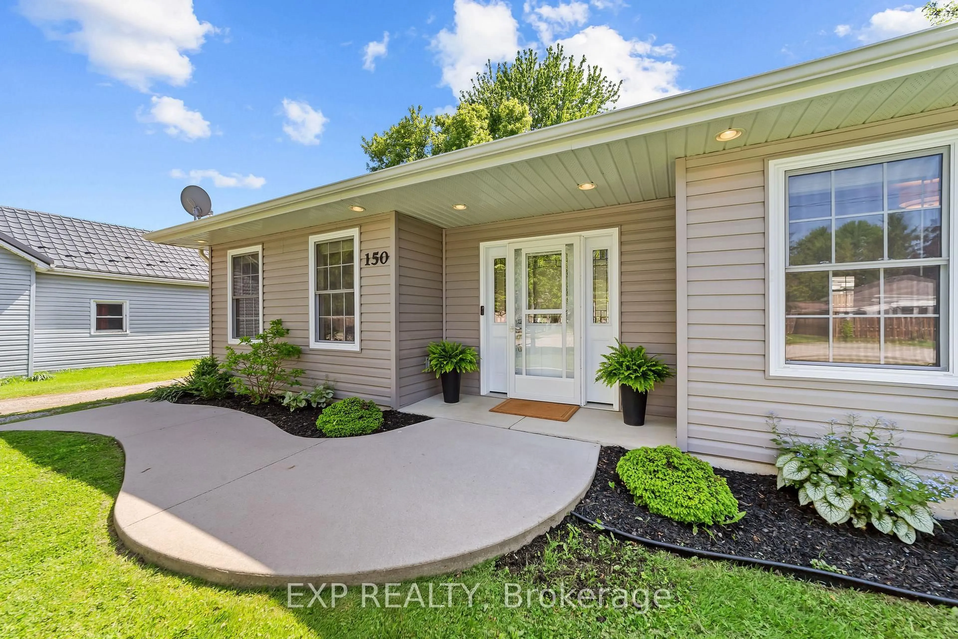 Home with vinyl exterior material, street for 150 O'Mara St, Southwest Middlesex Ontario N0L 1M0