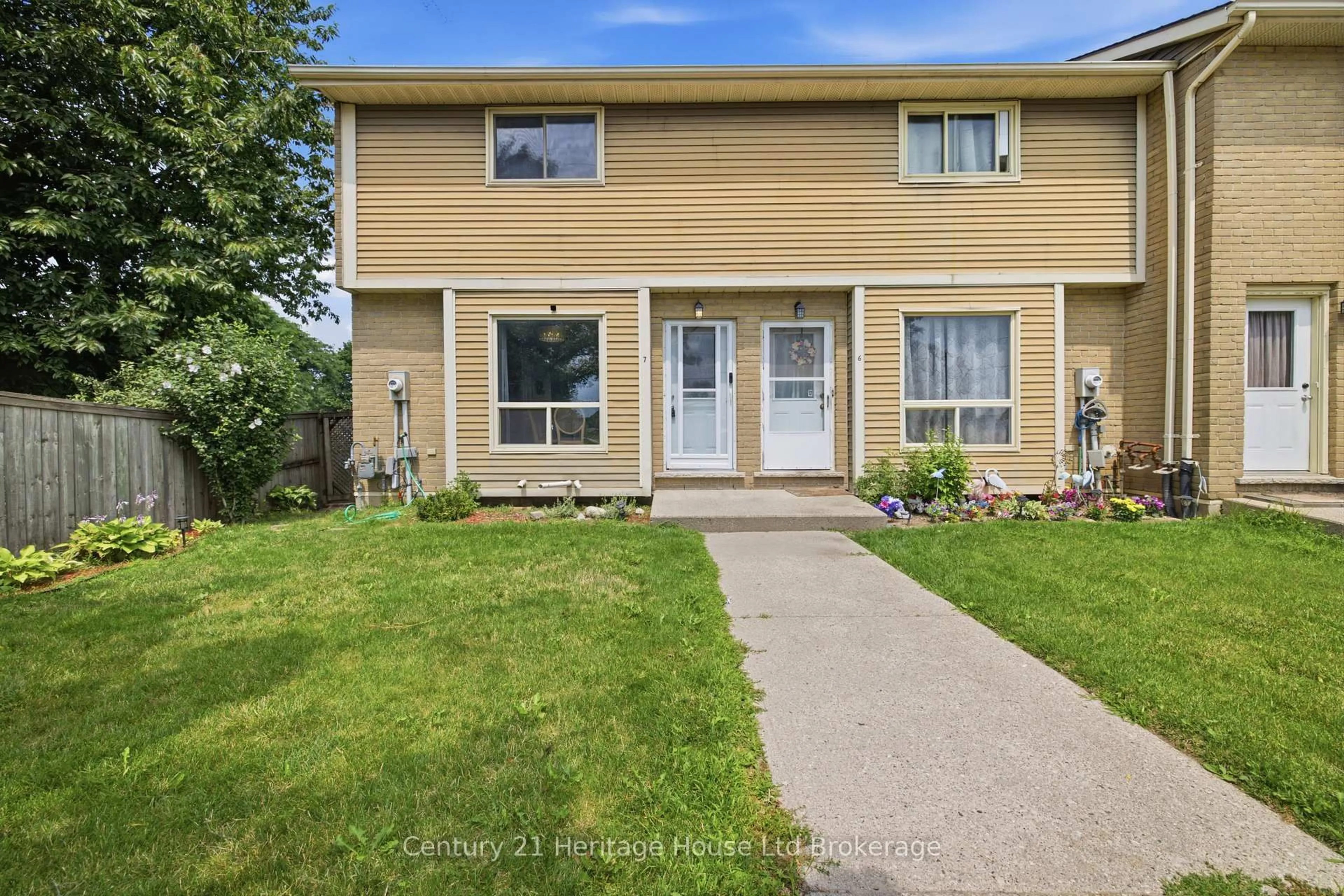 Home with vinyl exterior material, street for 863 Parkinson Rd #7, Woodstock Ontario N4S 8S7