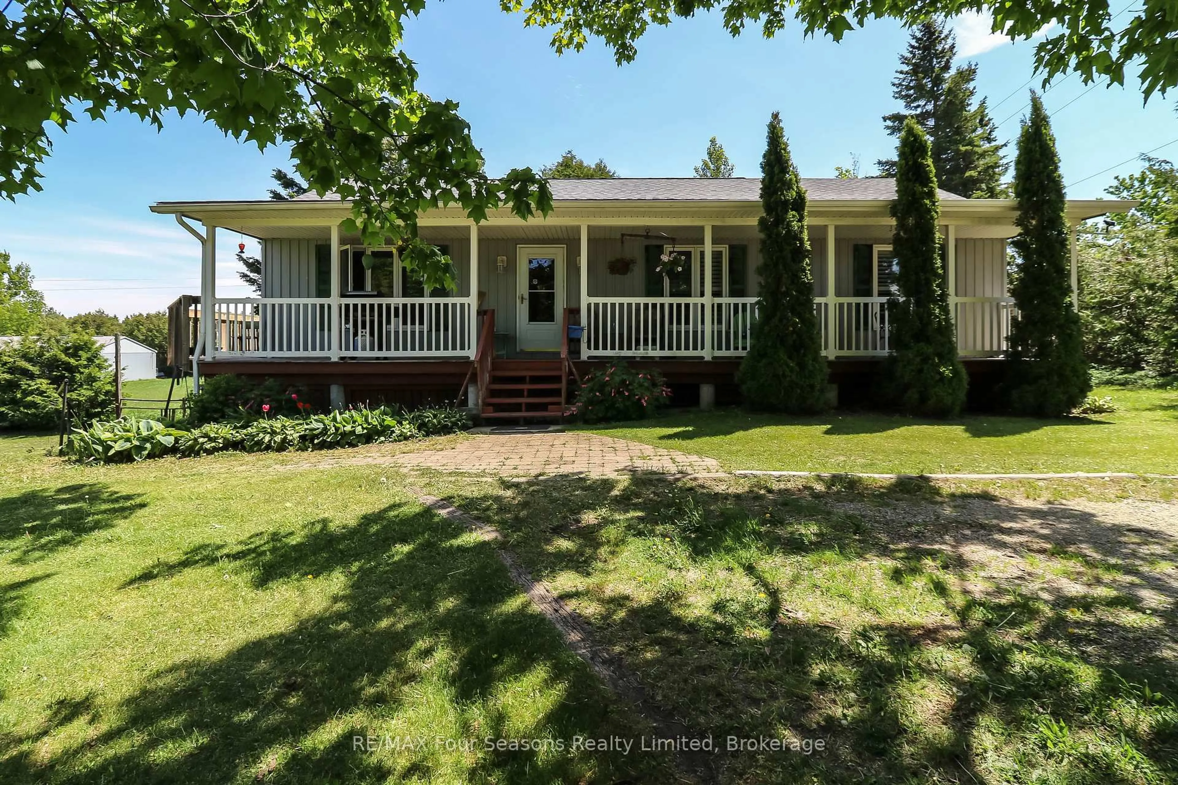 A pic from outside/outdoor area/front of a property/back of a property/a pic from drone, street for 595365 4th Line, Blue Mountains Ontario N0H 2E0