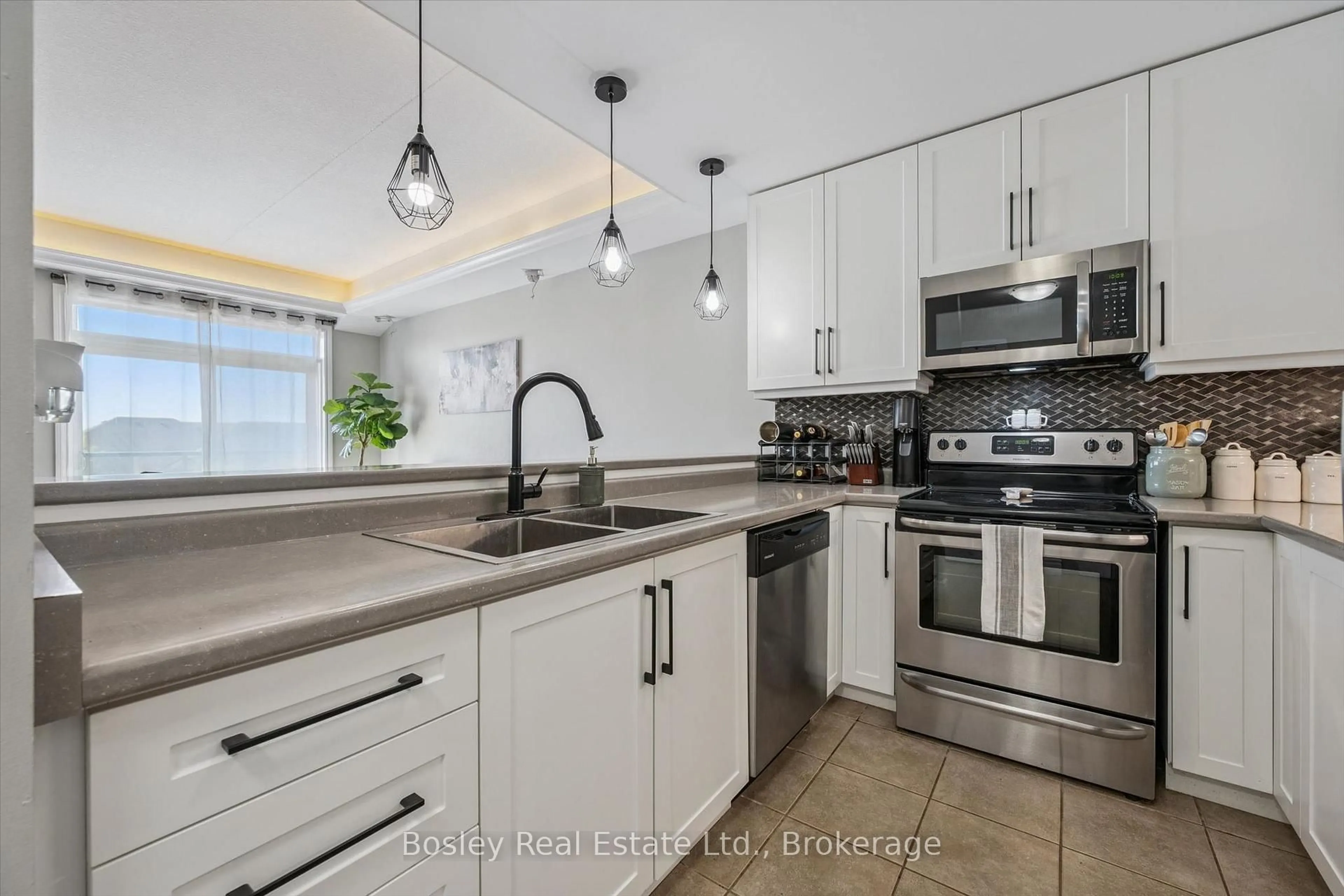 Open concept kitchen, ceramic/tile floor for 2 Colonial Dr #314, Guelph Ontario N1L 0K8