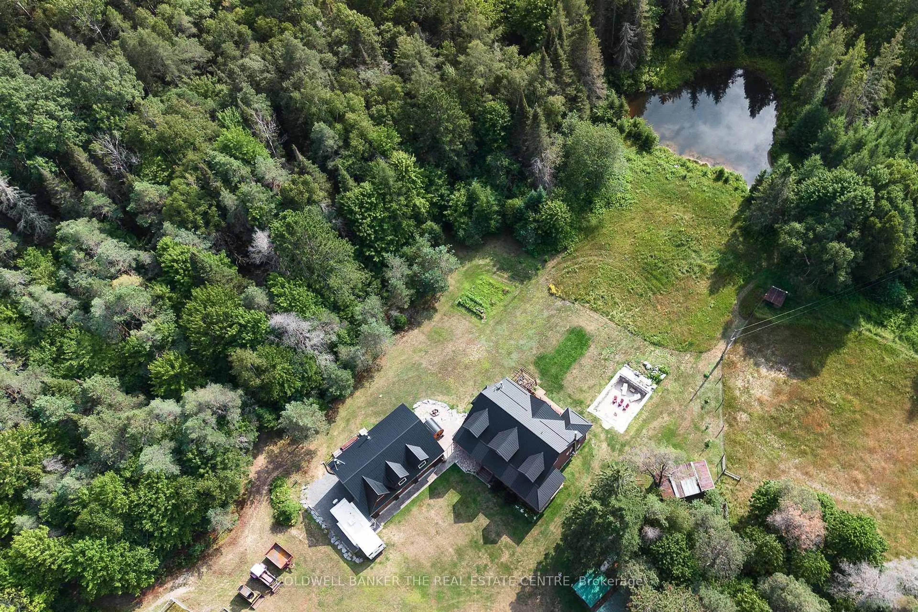 A pic from outside/outdoor area/front of a property/back of a property/a pic from drone, forest/trees view for 183 Pevensey Rd, Armour Ontario P0A 1C0