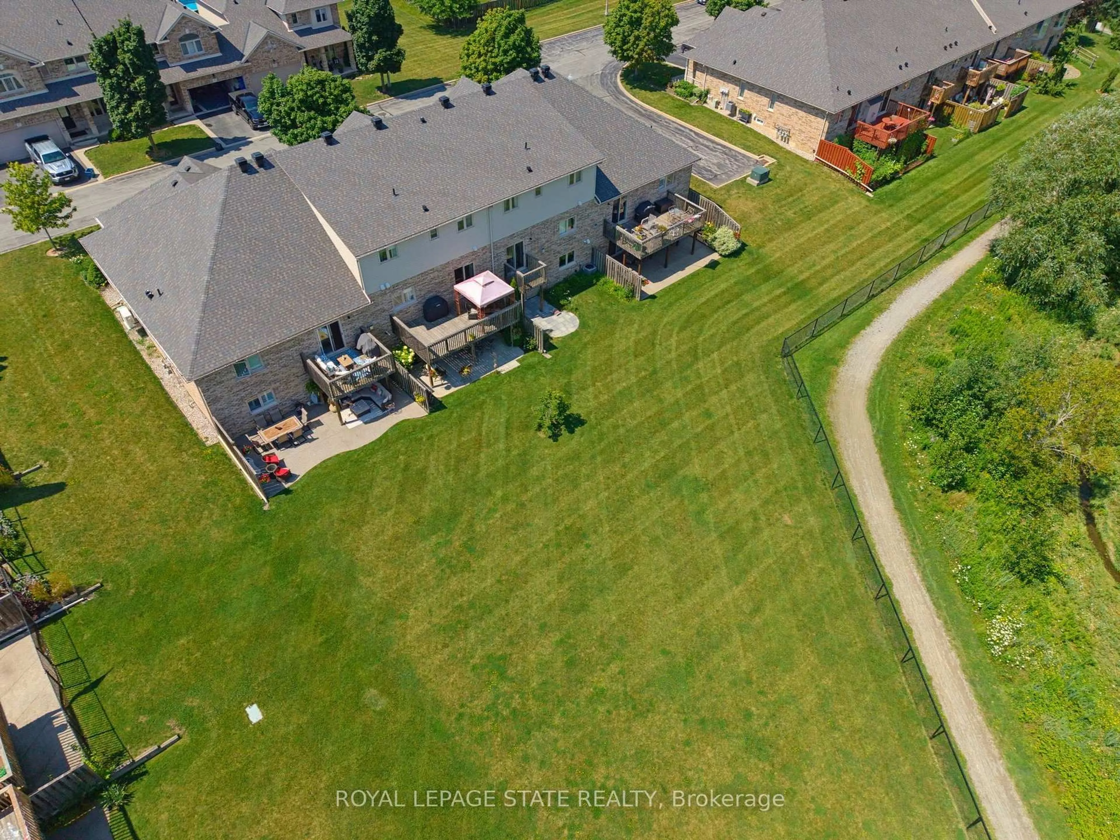 A pic from outside/outdoor area/front of a property/back of a property/a pic from drone, street for 310 Southbrook Dr #17, Hamilton Ontario L0R 1C0