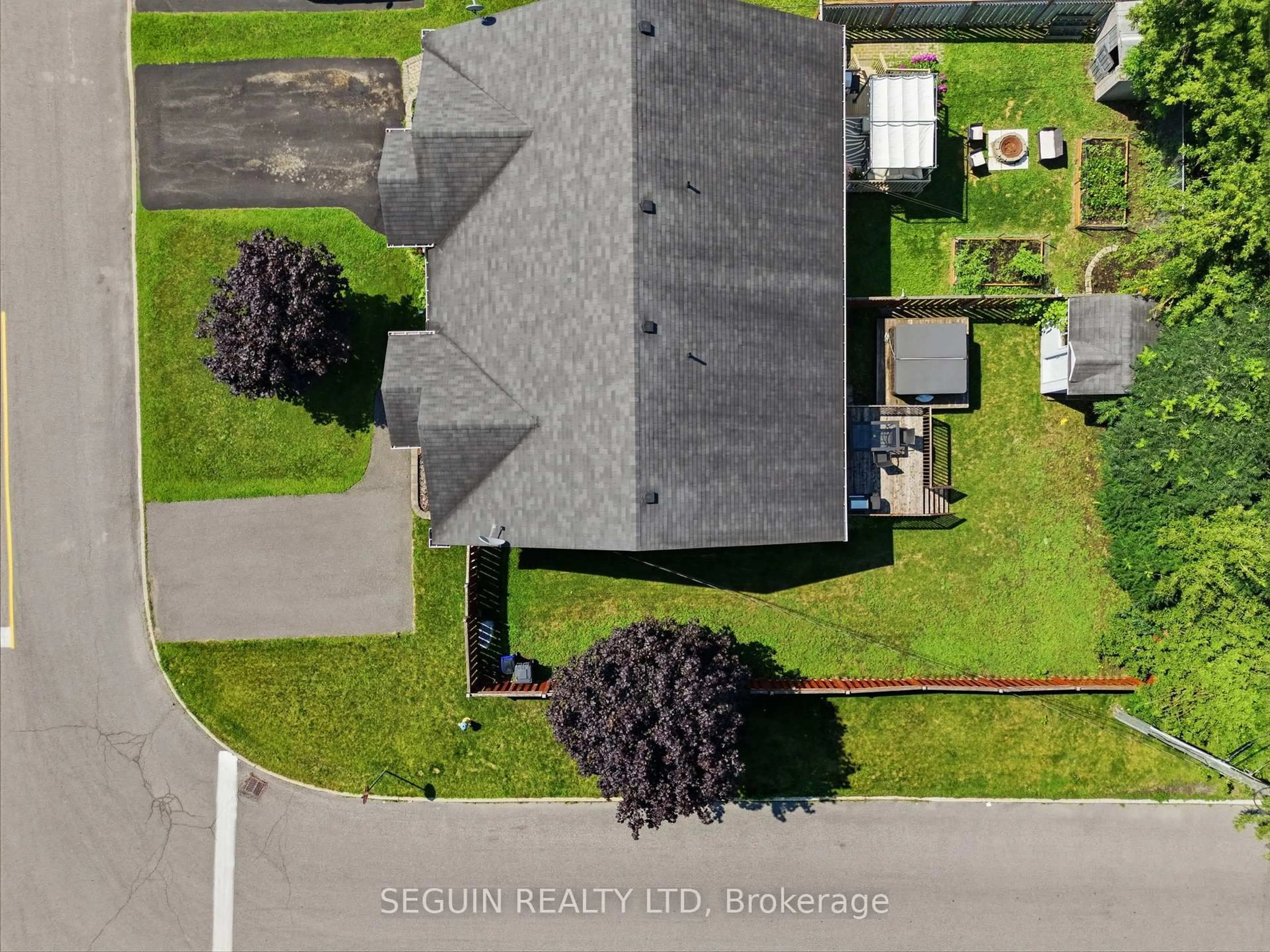 A pic from outside/outdoor area/front of a property/back of a property/a pic from drone, street for 410 Marc Andre St, Hawkesbury Ontario K6A 0A5