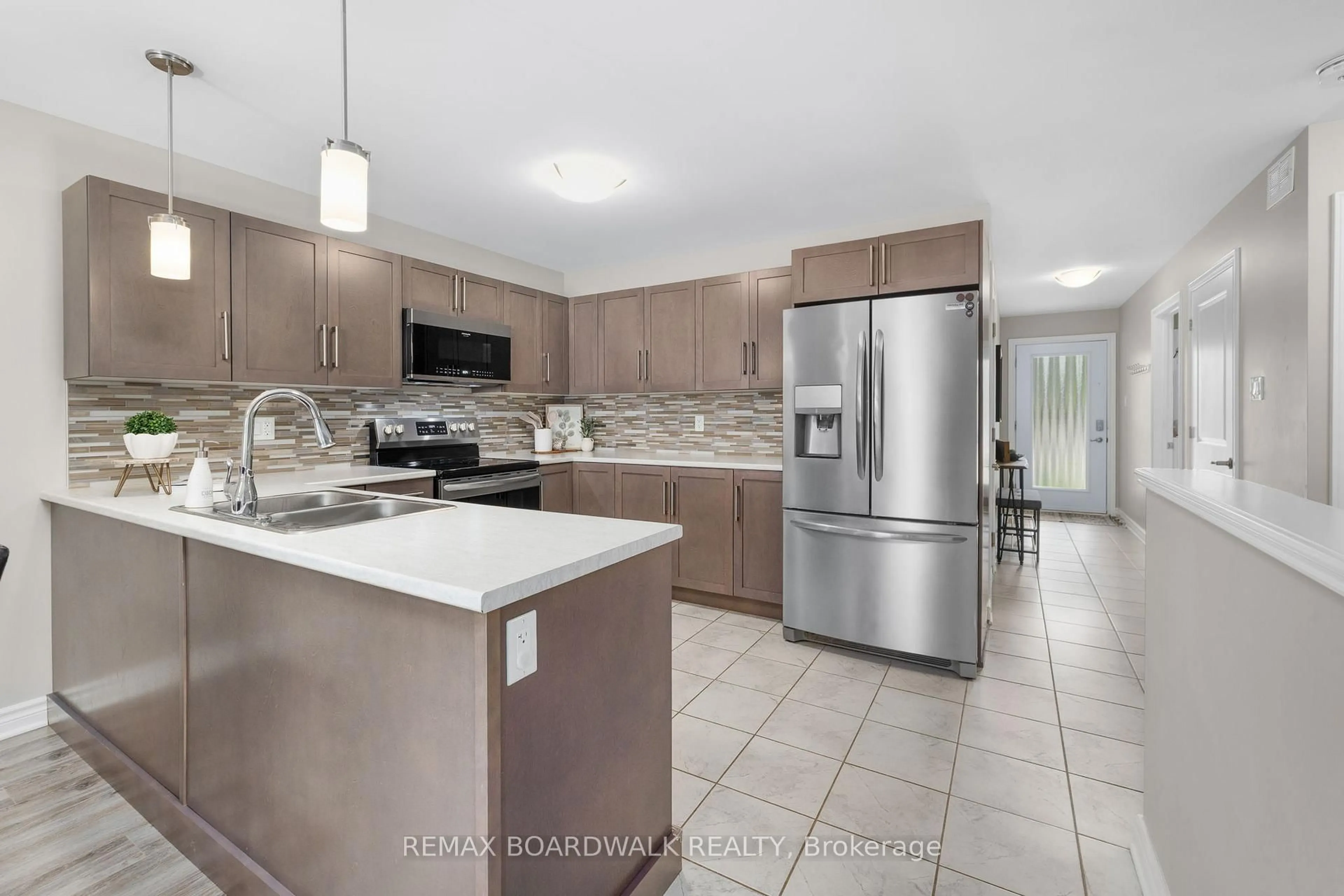 Open concept kitchen, ceramic/tile floor for 923 Leishman Dr, Almonte Ontario K0A 1A0