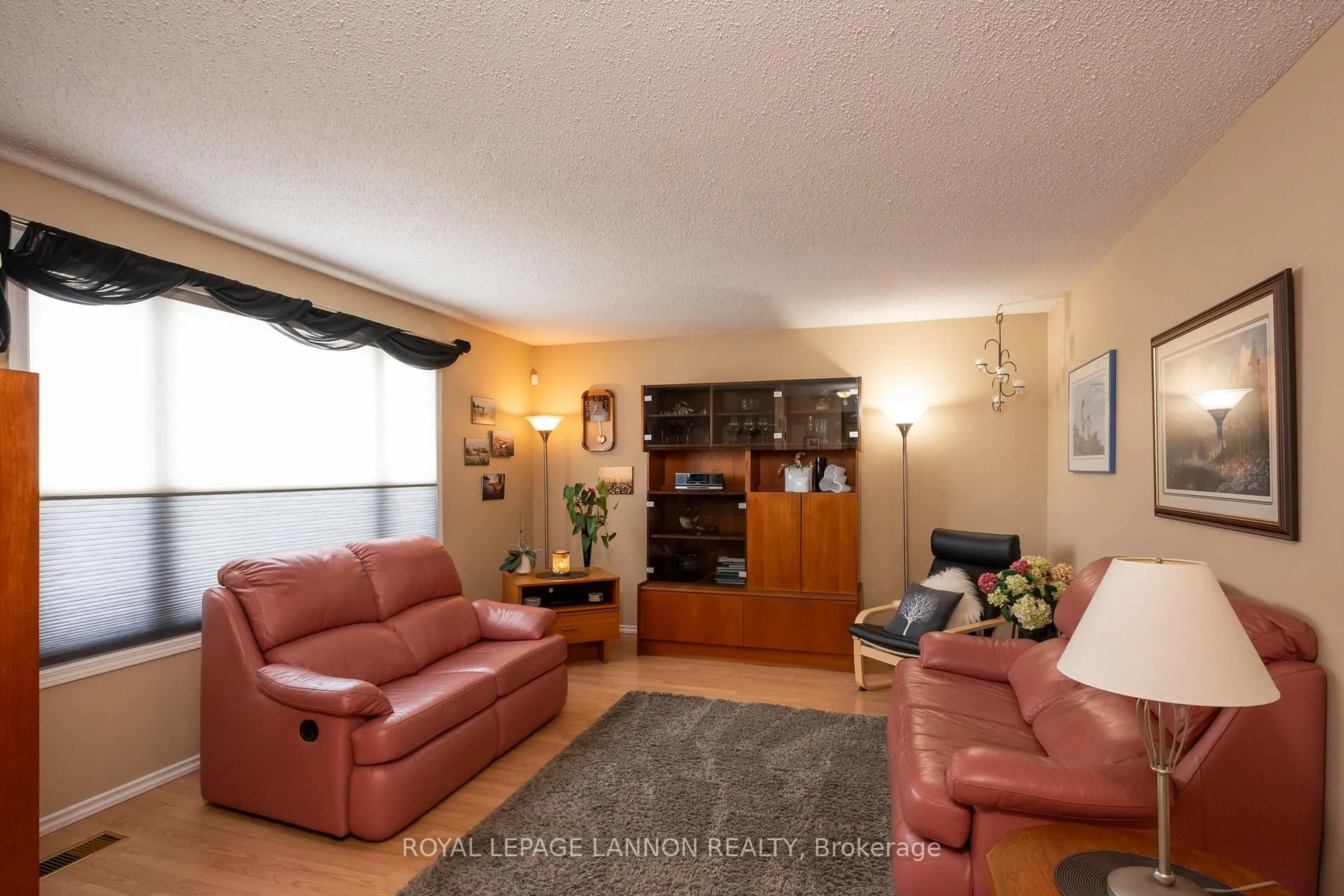 Living room with furniture, wood/laminate floor for 237 Anten St., Thunder Bay Ontario P7B 5J5