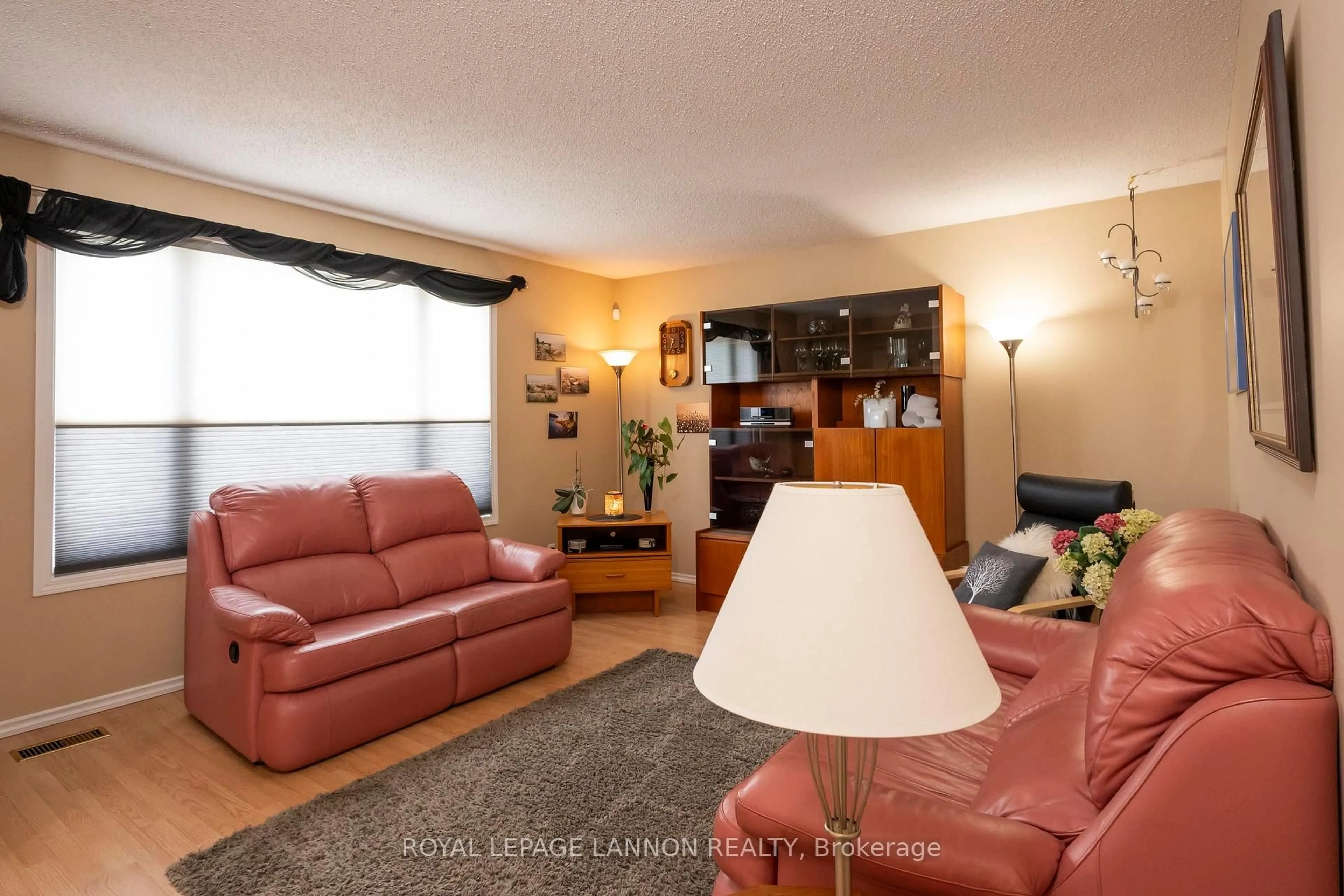 Living room with furniture, wood/laminate floor for 237 Anten St., Thunder Bay Ontario P7B 5J5