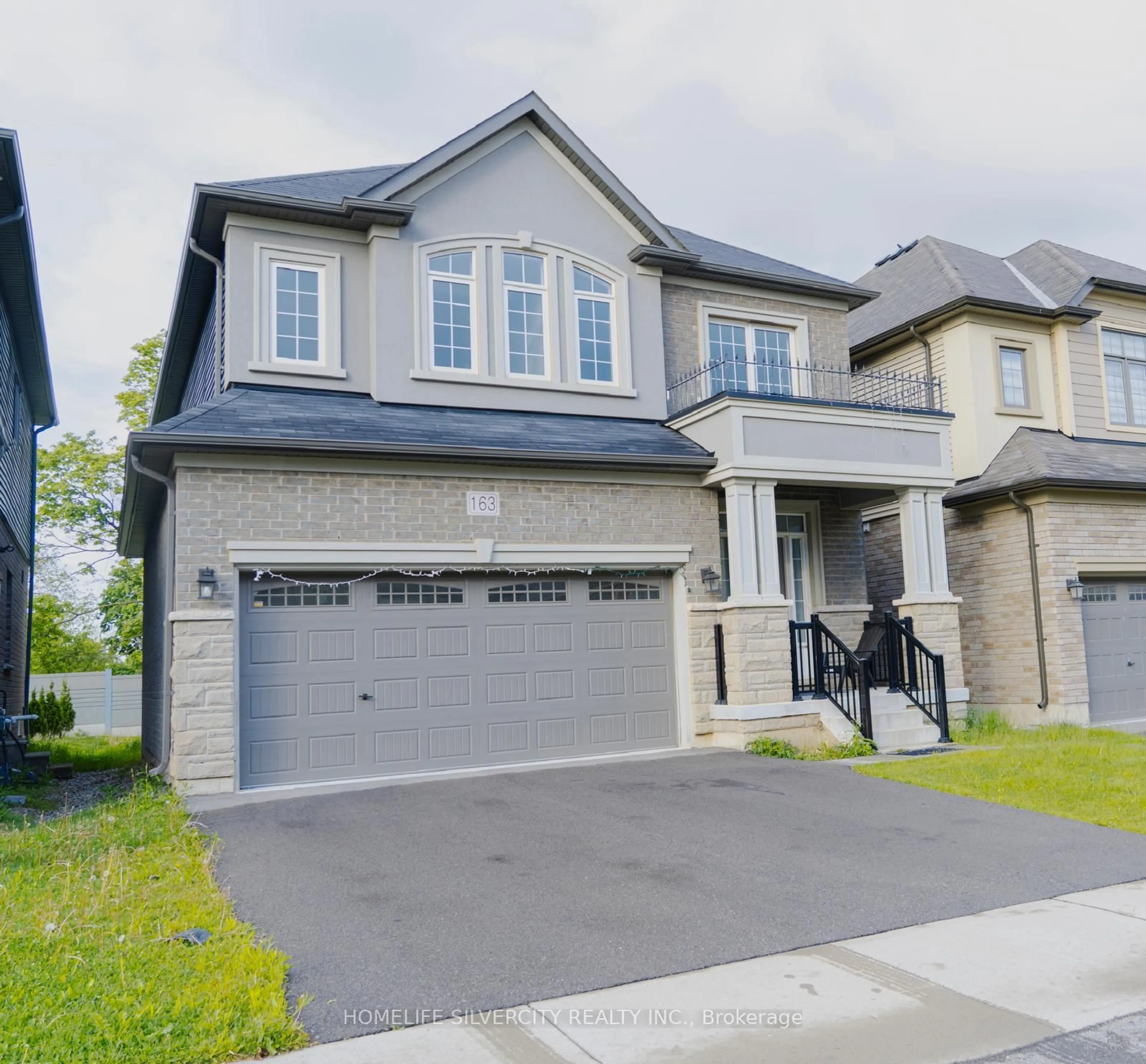 Home with brick exterior material, street for 163 Bilansky Farm Rd, Brantford Ontario N3S 0J3