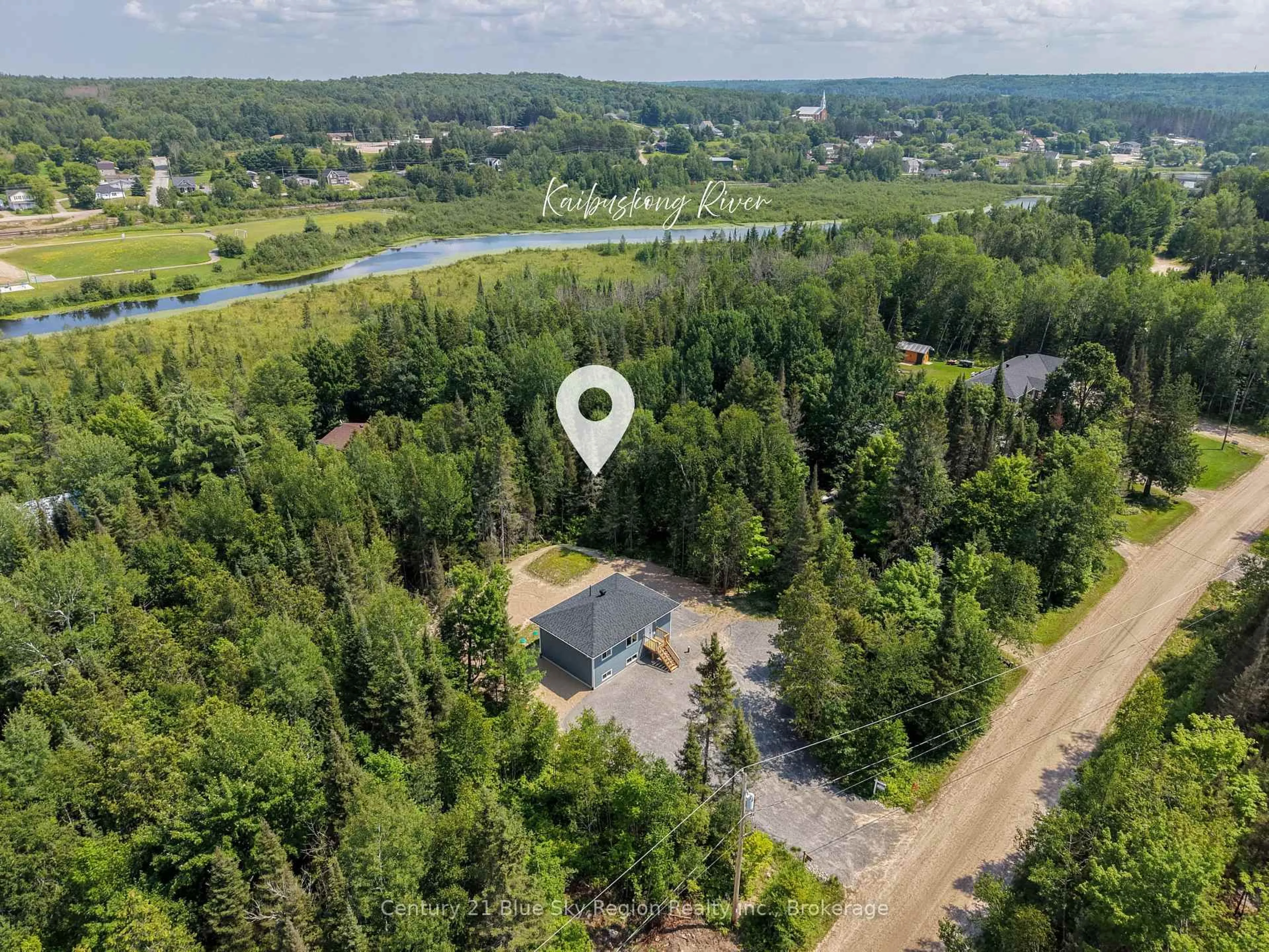 A pic from outside/outdoor area/front of a property/back of a property/a pic from drone, forest/trees view for 112 Riverside Dr, Bonfield Ontario P0H 1E0