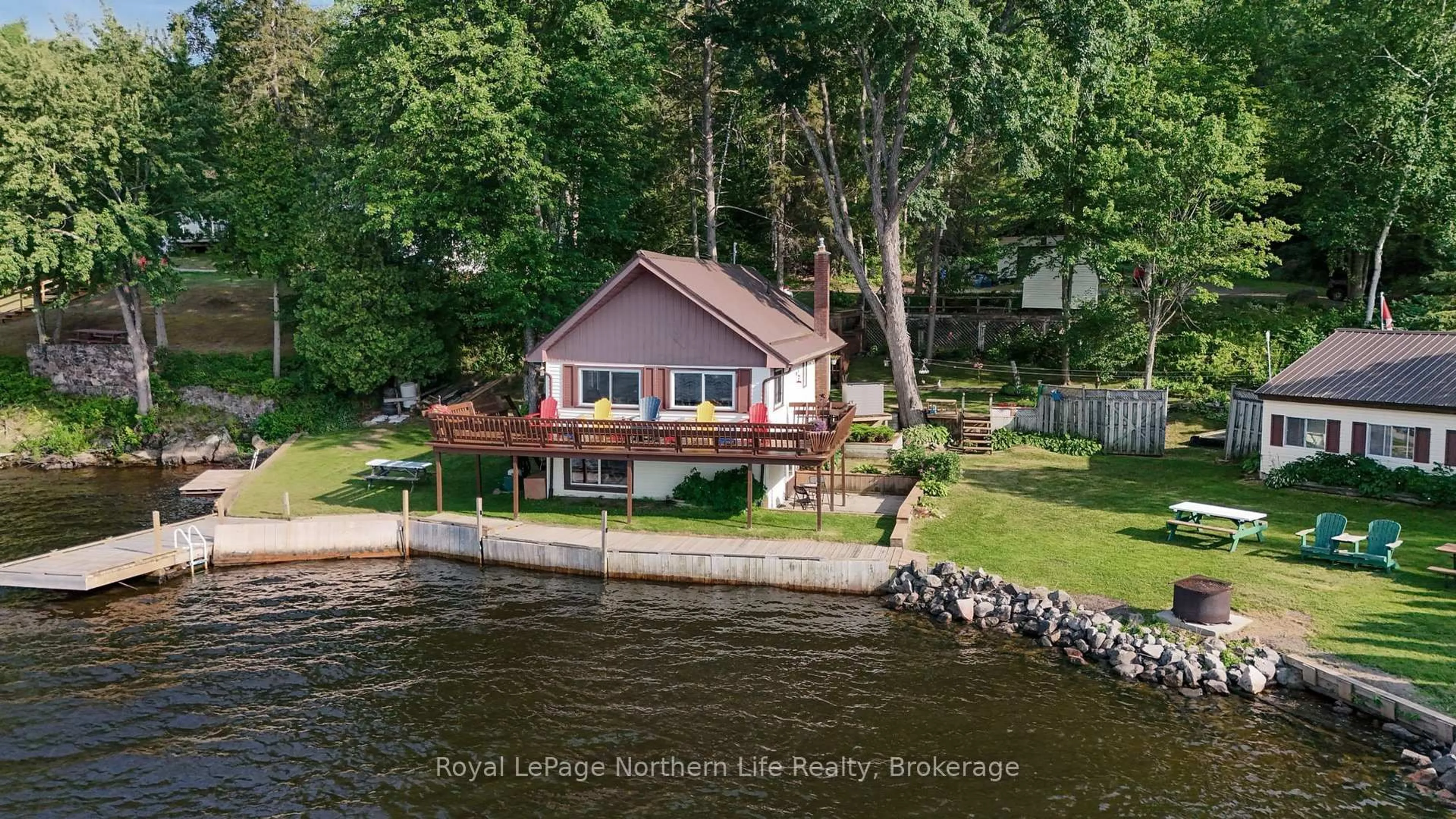 A pic from outside/outdoor area/front of a property/back of a property/a pic from drone, water/lake/river/ocean view for 216 Green Rd, Callander Ontario P0H 1H0