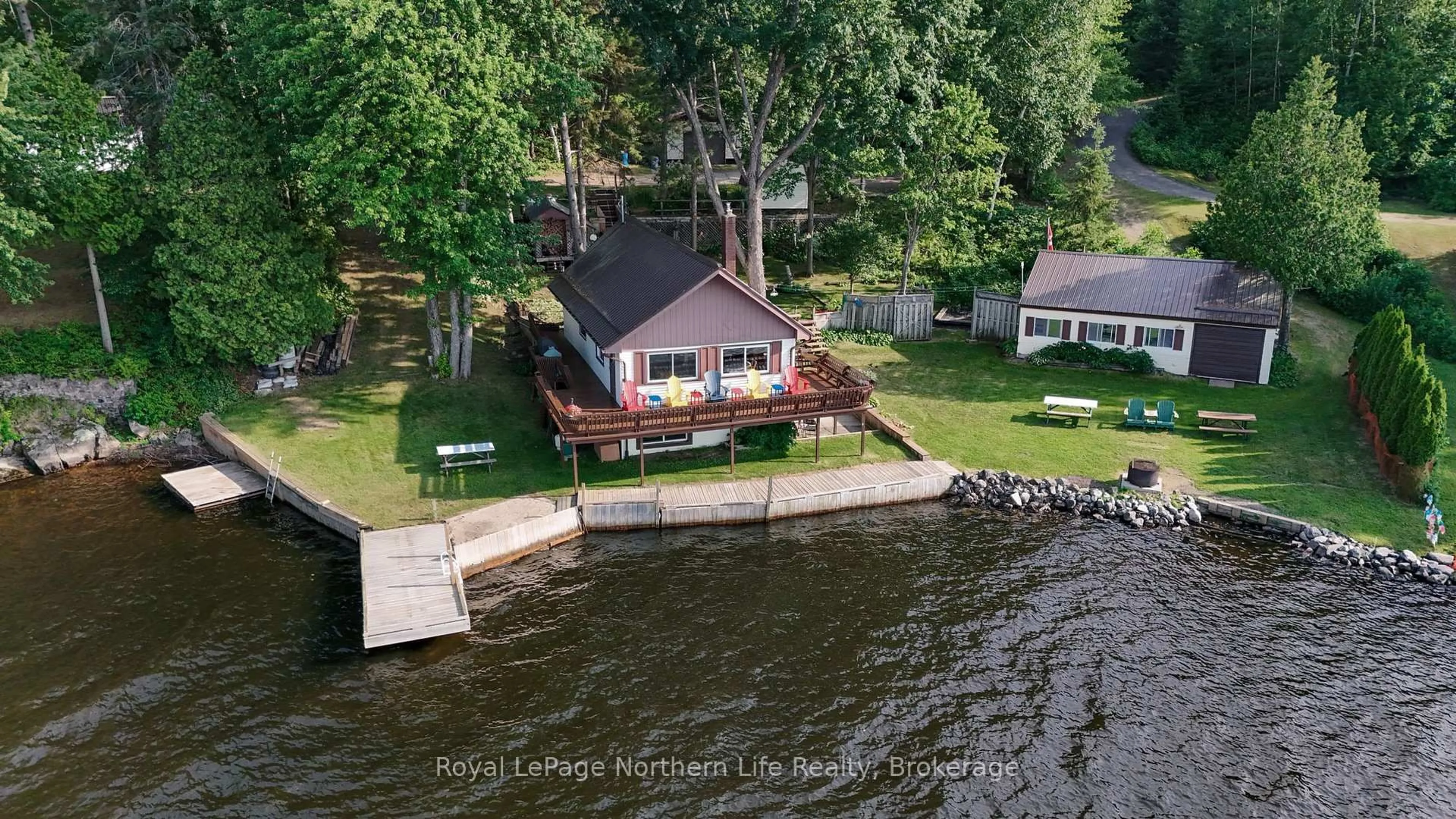 A pic from outside/outdoor area/front of a property/back of a property/a pic from drone, water/lake/river/ocean view for 216 Green Rd, Callander Ontario P0H 1H0
