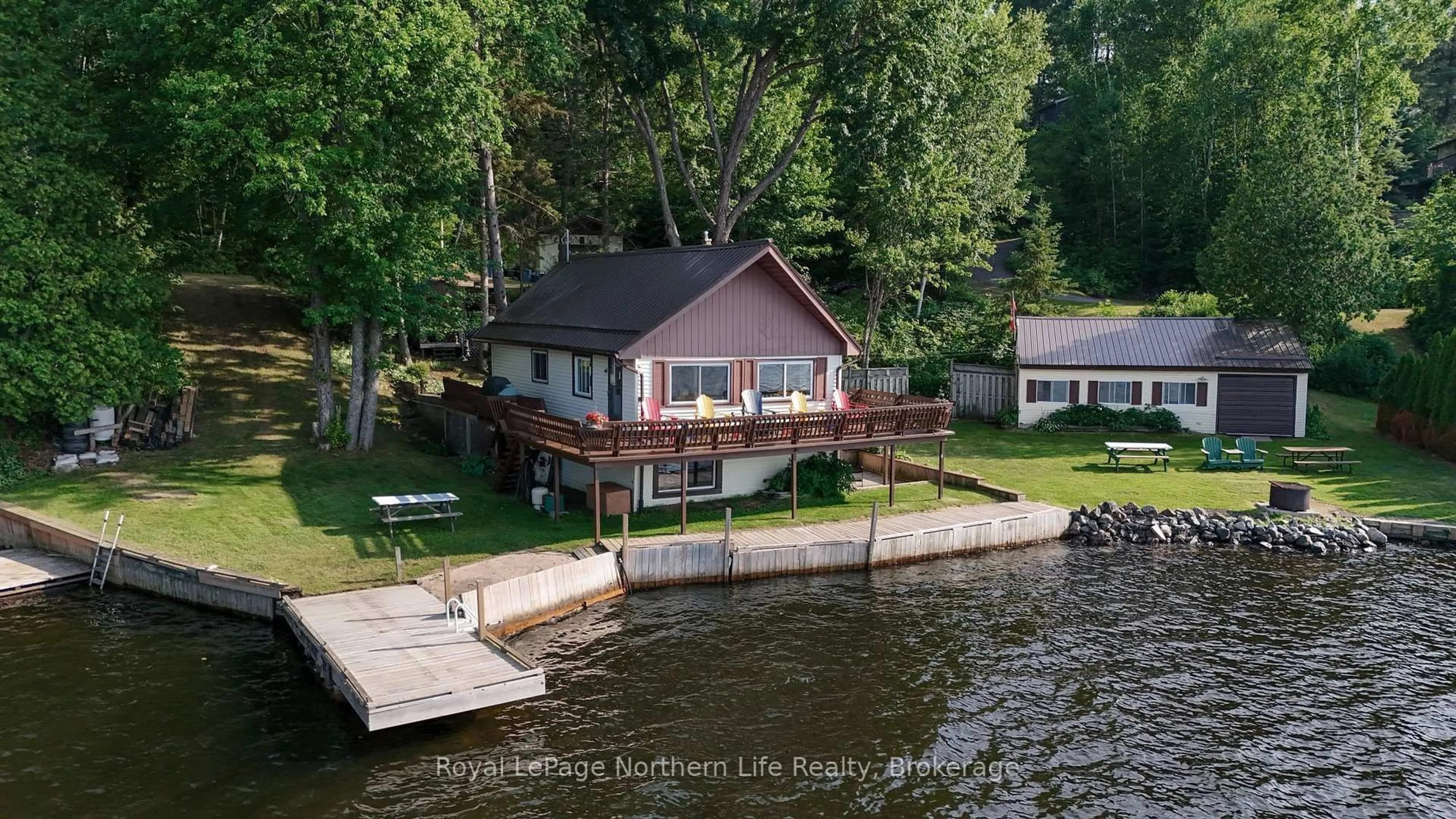 A pic from outside/outdoor area/front of a property/back of a property/a pic from drone, water/lake/river/ocean view for 216 Green Rd, Callander Ontario P0H 1H0