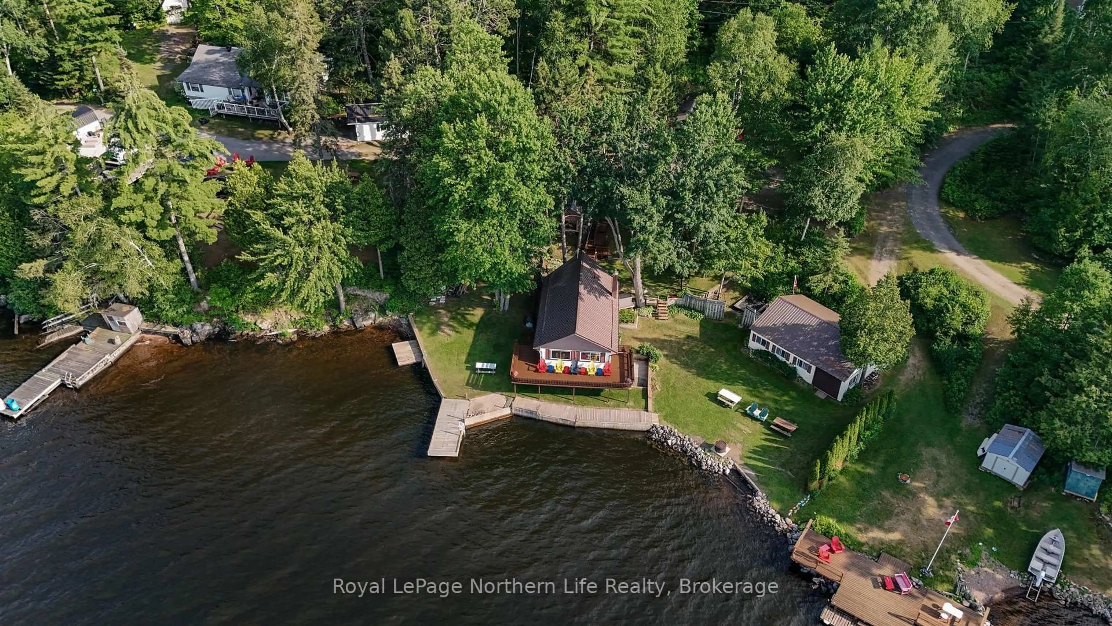 A pic from outside/outdoor area/front of a property/back of a property/a pic from drone, water/lake/river/ocean view for 216 Green Rd, Callander Ontario P0H 1H0