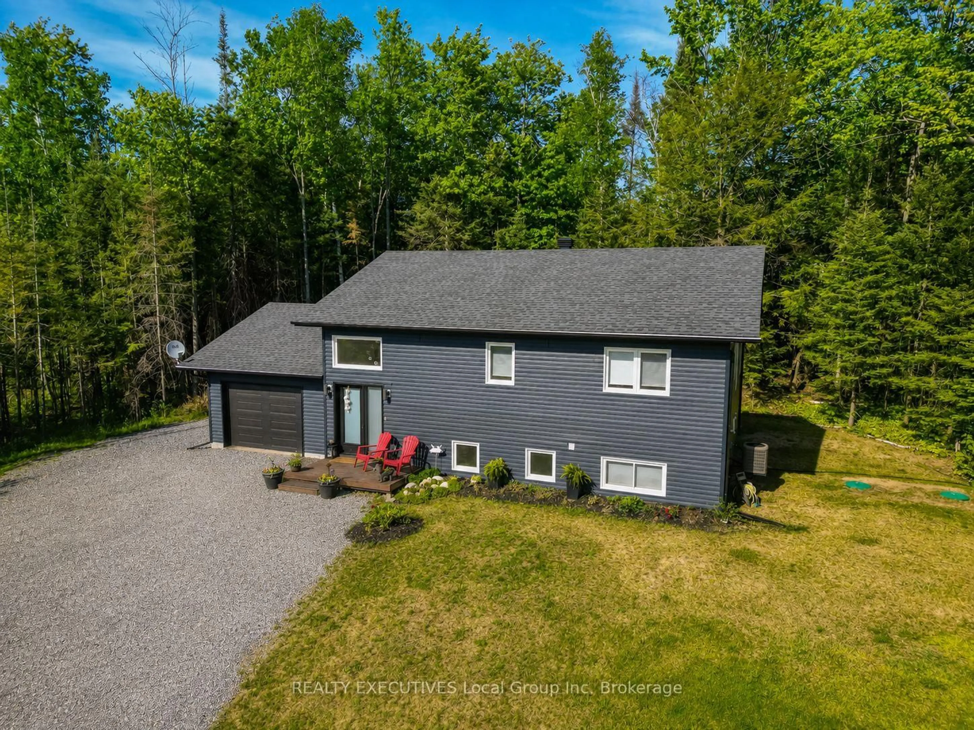 A pic from outside/outdoor area/front of a property/back of a property/a pic from drone, unknown for 61 Astor St, East Ferris Ontario P0H 1B0