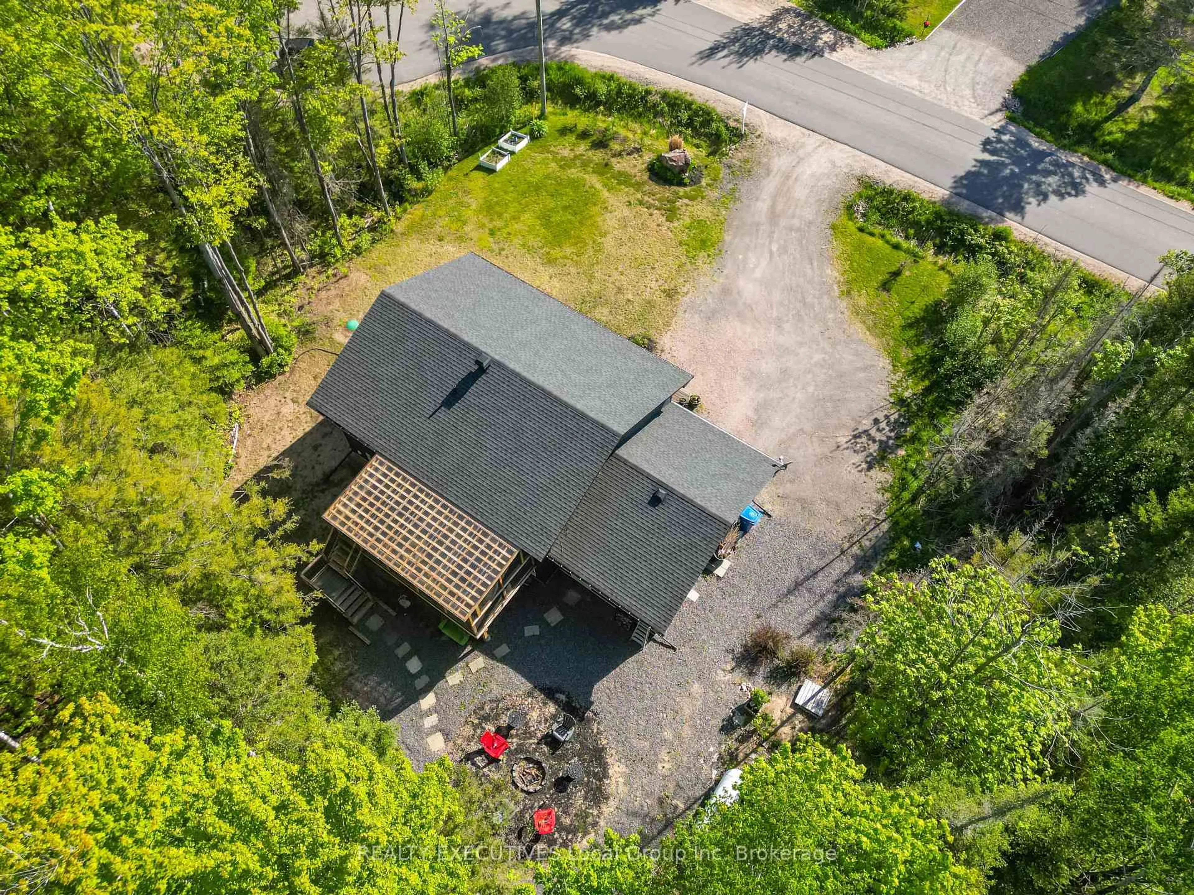 A pic from outside/outdoor area/front of a property/back of a property/a pic from drone, unknown for 61 Astor St, East Ferris Ontario P0H 1B0