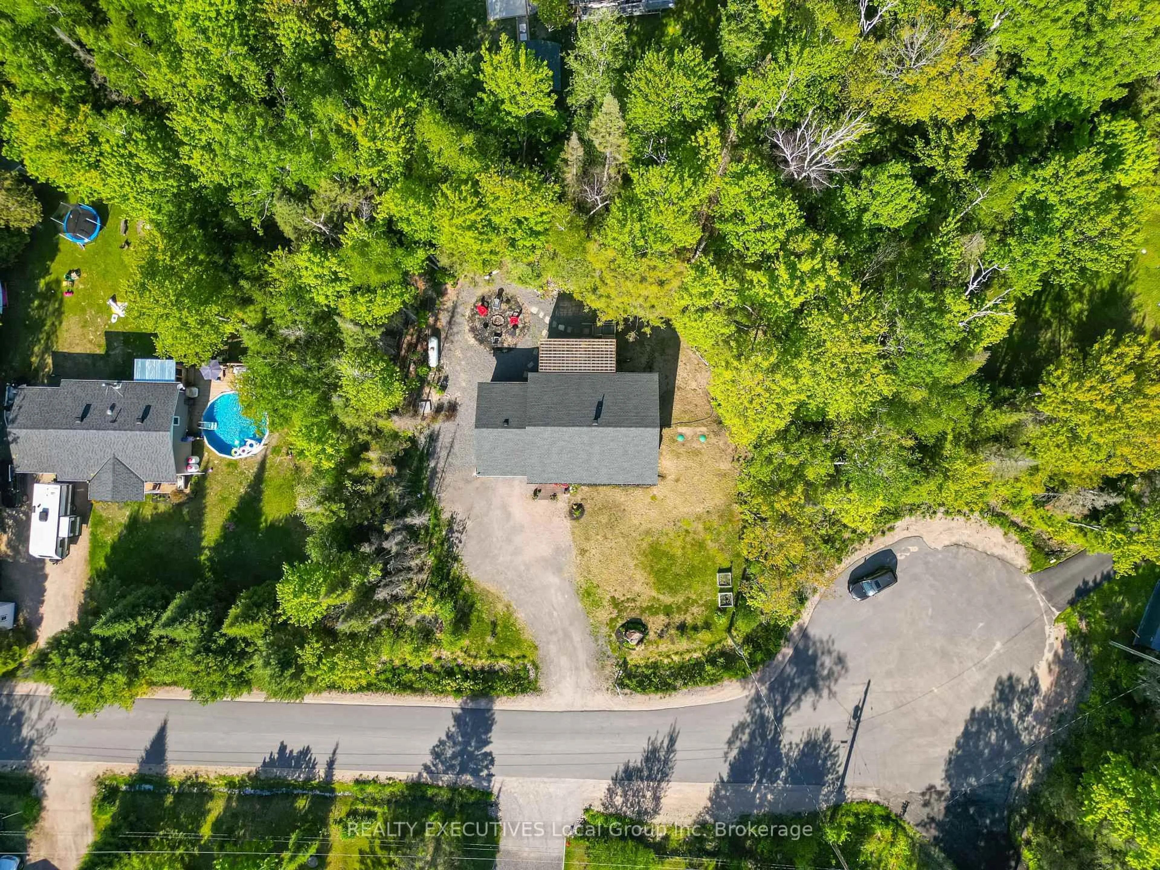 A pic from outside/outdoor area/front of a property/back of a property/a pic from drone, forest/trees view for 61 Astor St, East Ferris Ontario P0H 1B0