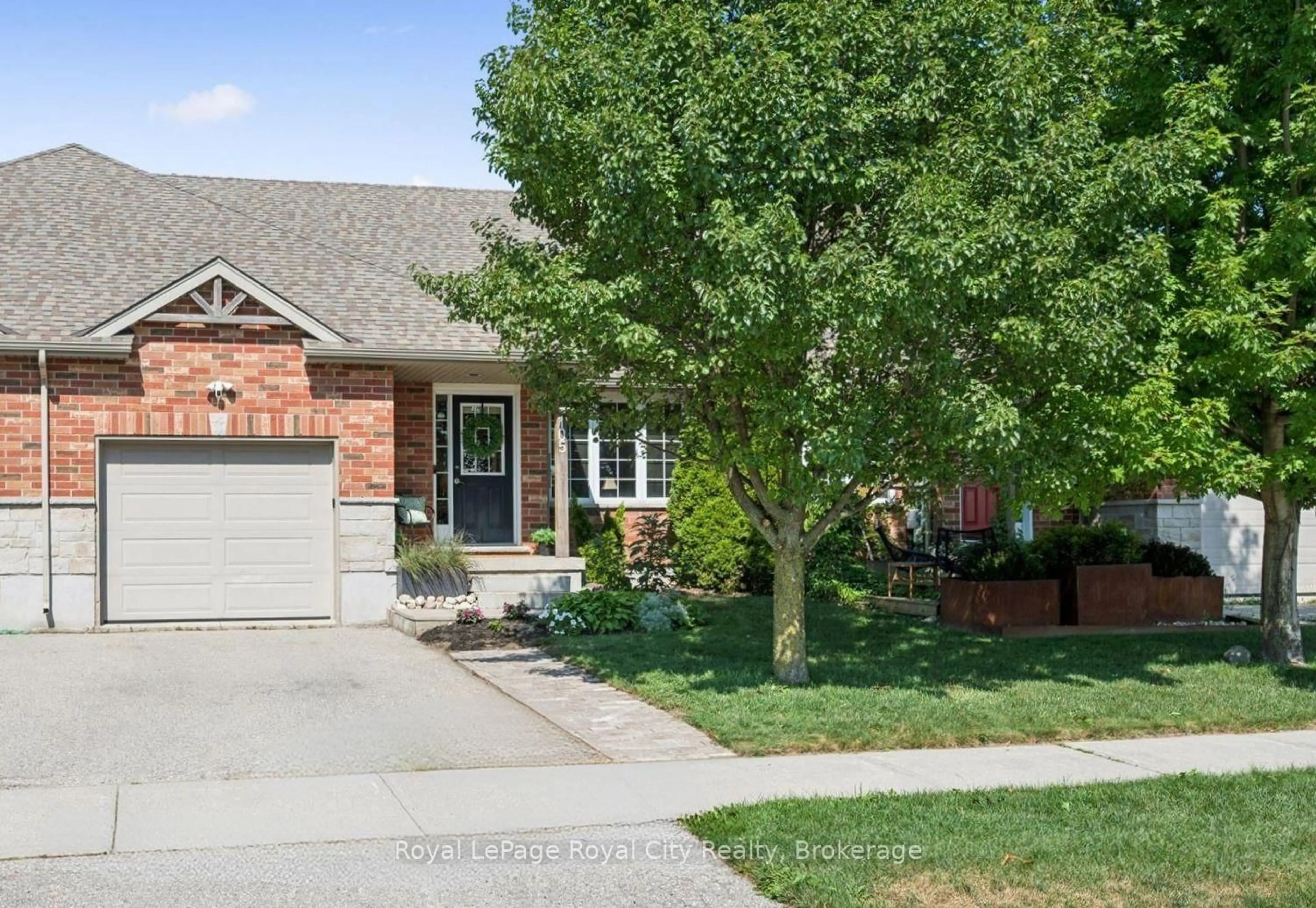 Home with brick exterior material, street for 105 Spencer Dr, Centre Wellington Ontario N0B 1S0