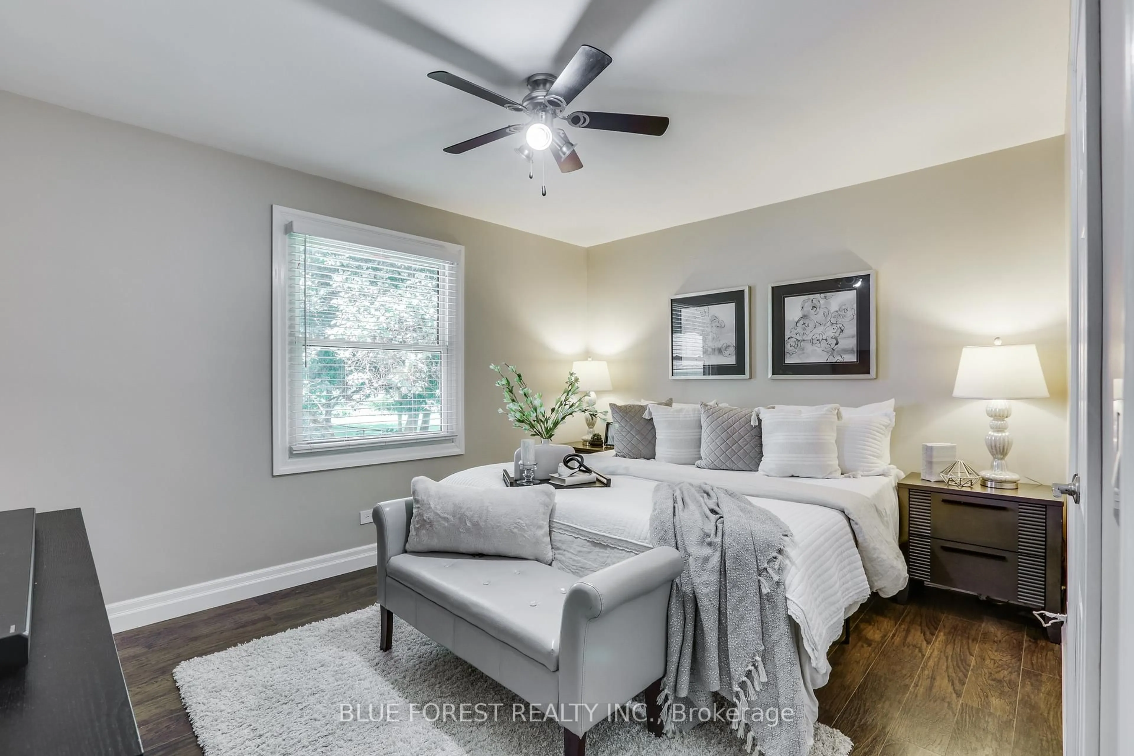 Bedroom with bed, wood/laminate floor for 114 Graham Rd, West Elgin Ontario N0L 2P0