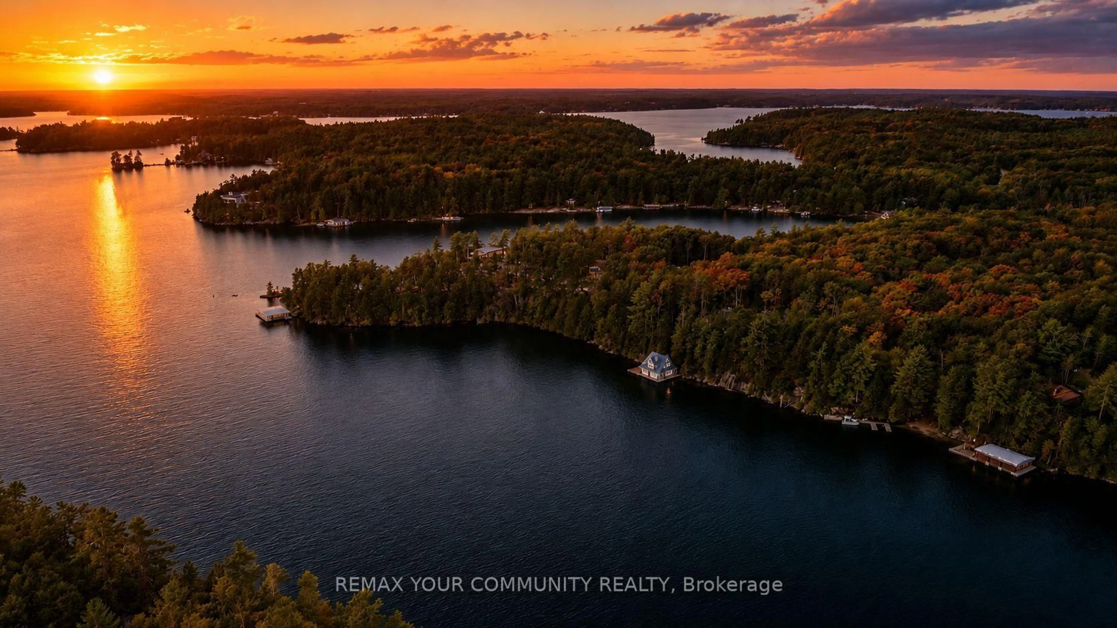 A pic from outside/outdoor area/front of a property/back of a property/a pic from drone, water/lake/river/ocean view for 13 Veronica Gene Lane, Muskoka Lakes Ontario P0C 1J0