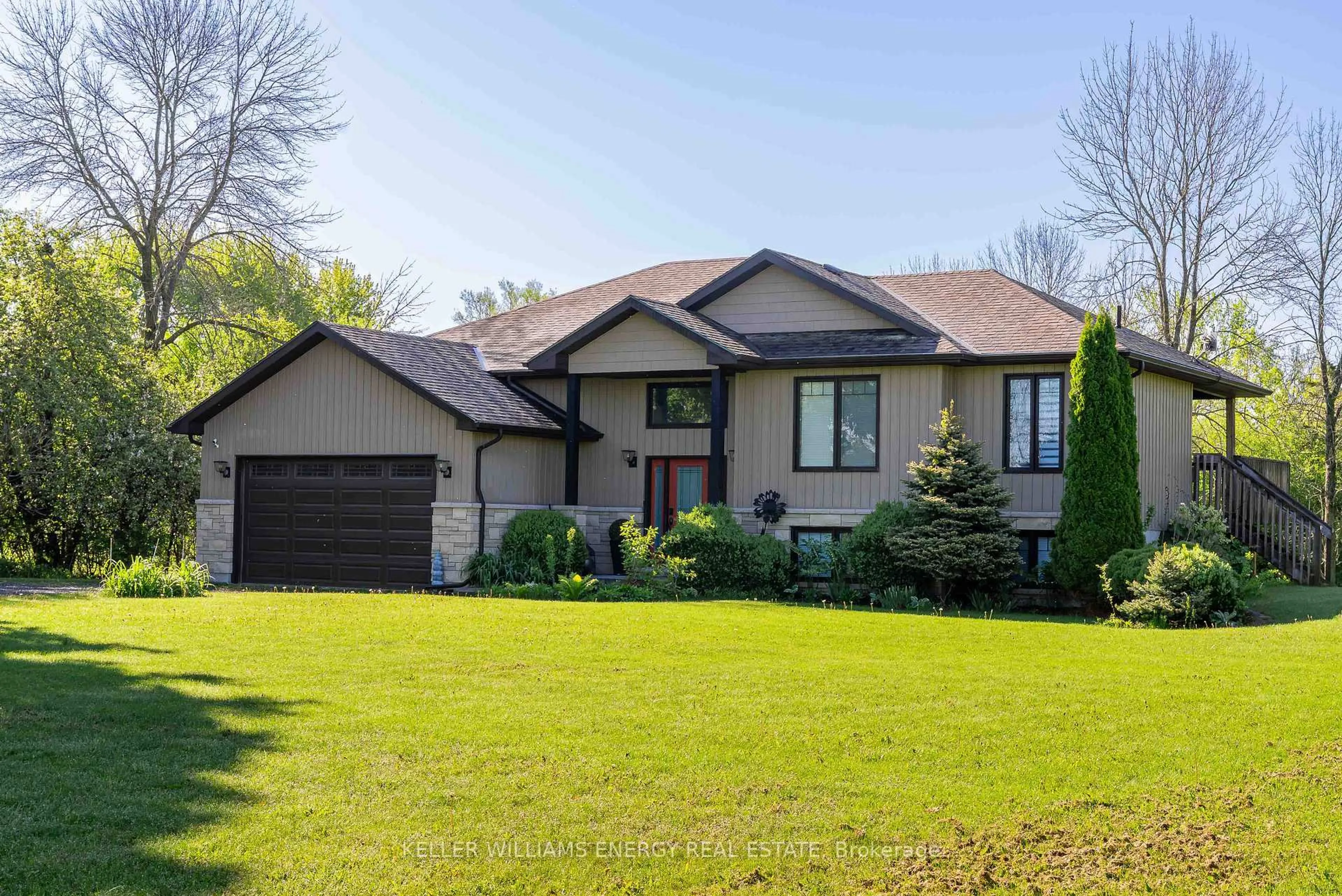 Home with vinyl exterior material, street for 1687 Lakeside Dr, Prince Edward County Ontario K0K 1T0
