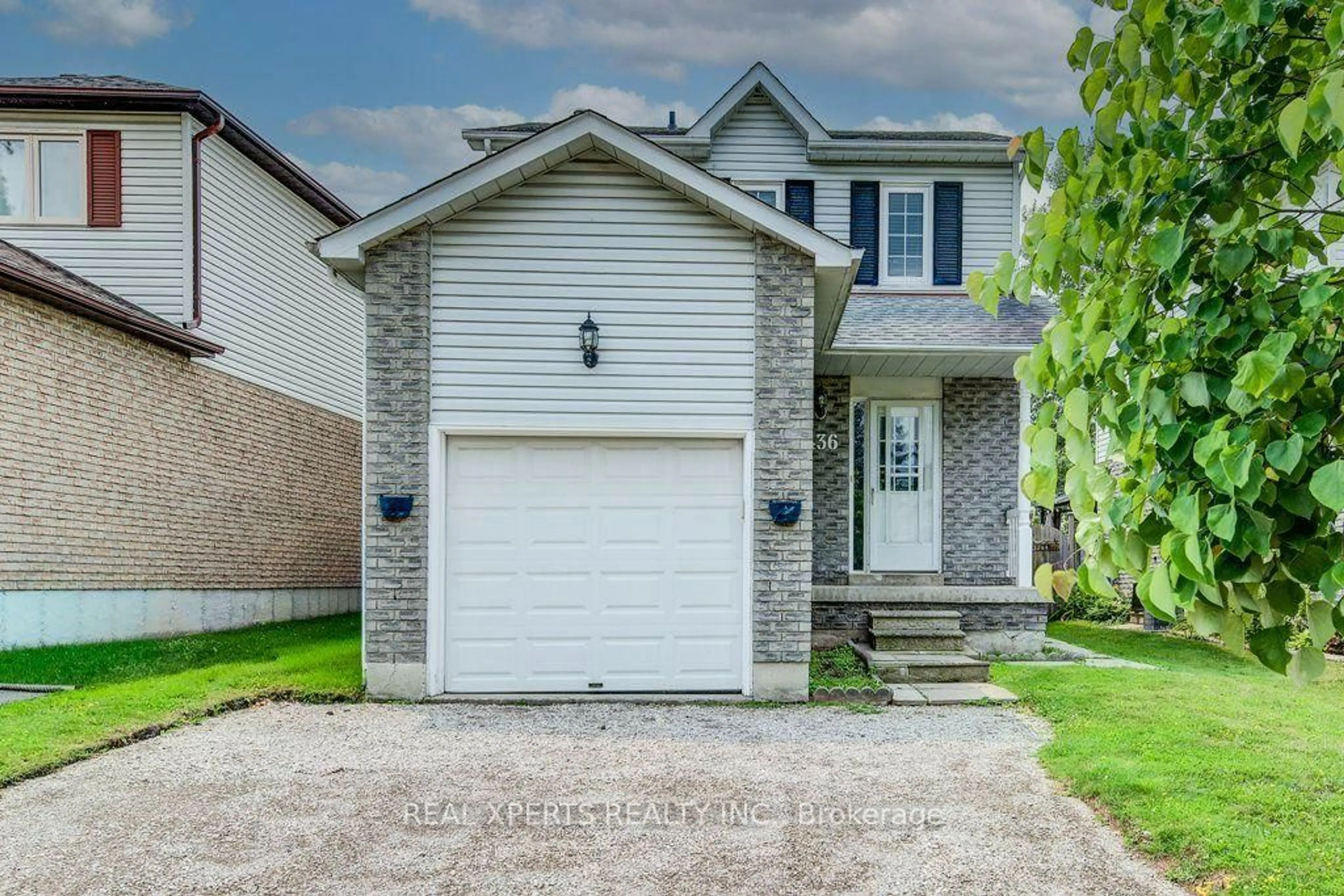 Home with vinyl exterior material, street for 436 Auden Rd, Guelph Ontario N1E 6V7