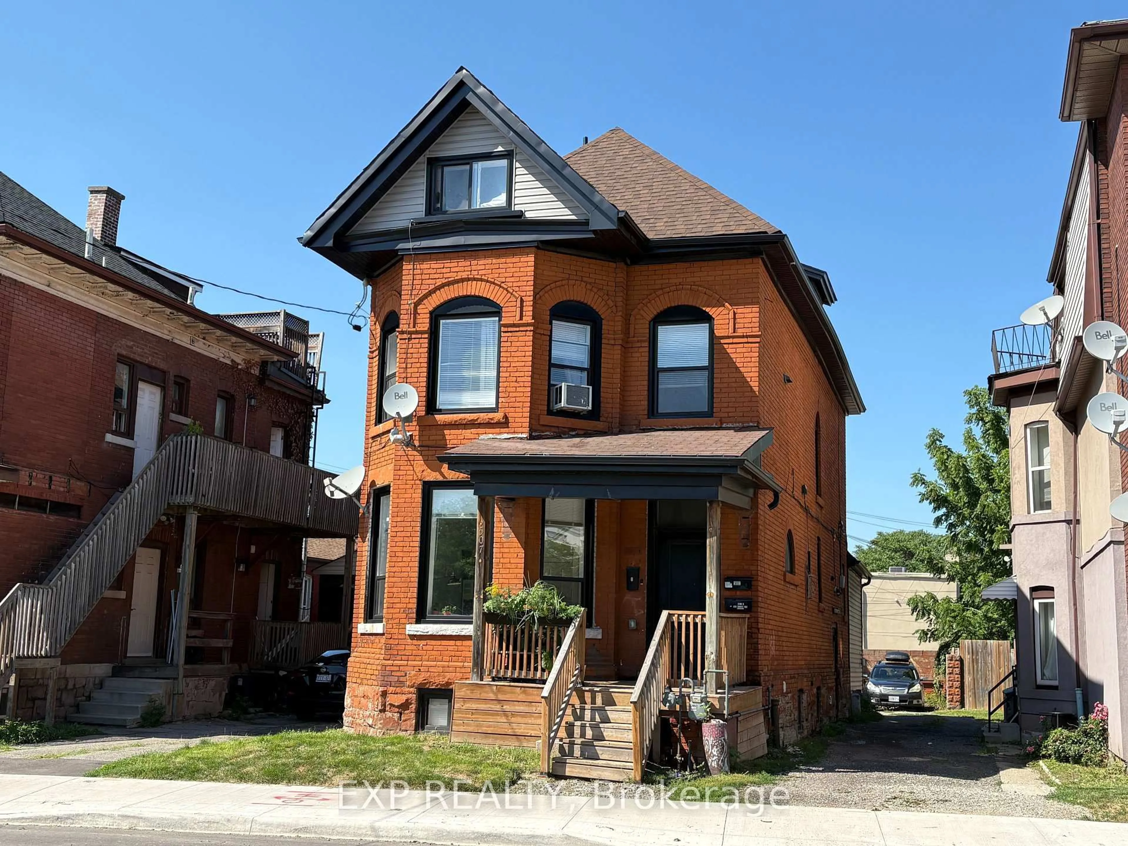 Home with brick exterior material, street for 507 Wilson St, Hamilton Ontario L8L 1T4