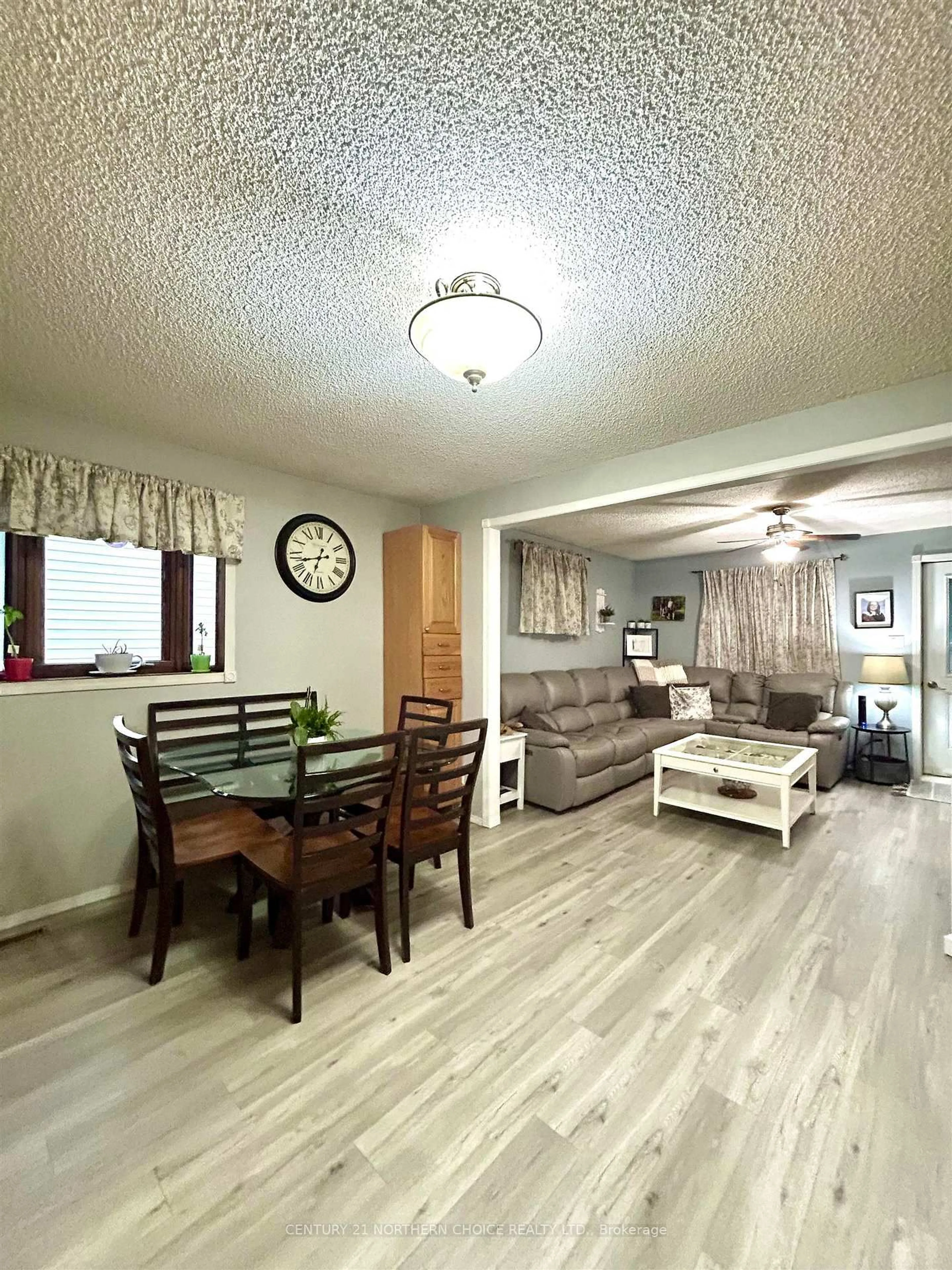 Living room with furniture, wood/laminate floor for 554 Elm Avenue, Fort Frances Ontario P9A 3J4