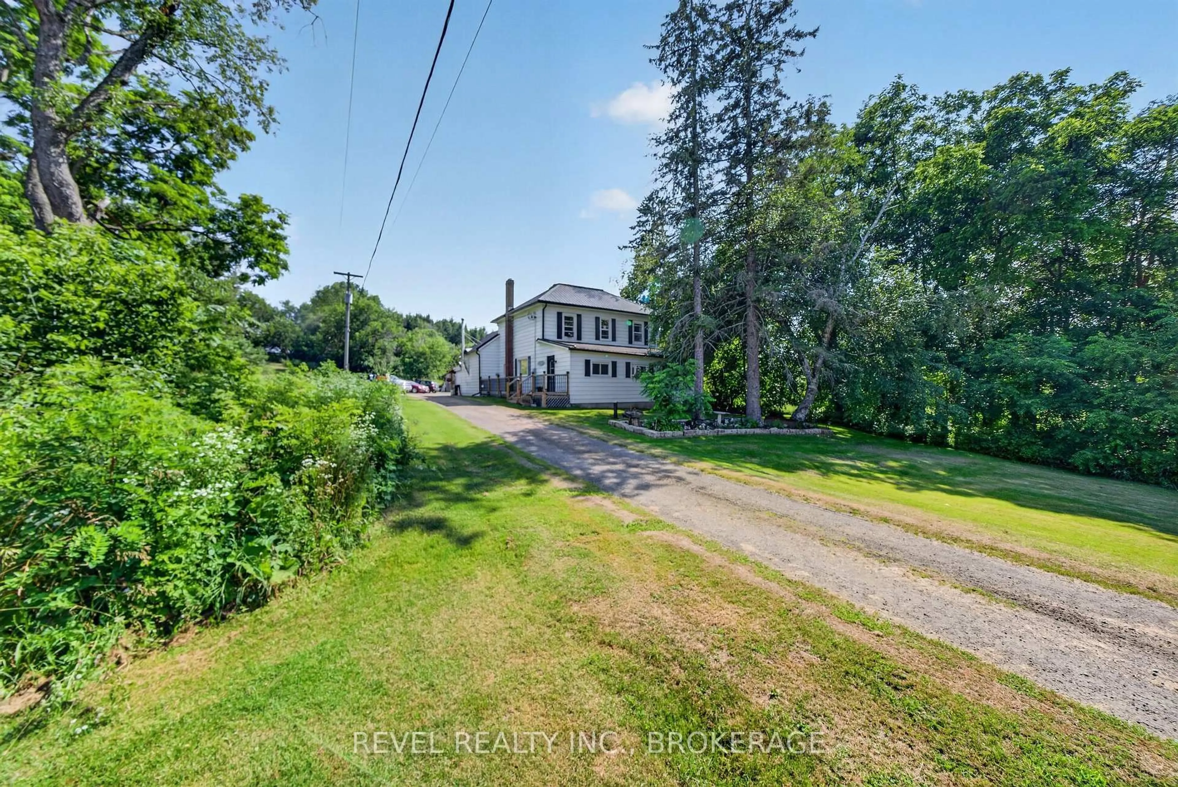 A pic from outside/outdoor area/front of a property/back of a property/a pic from drone, unknown for 1905 Rutledge Rd, Sydenham Ontario K0H 2T0