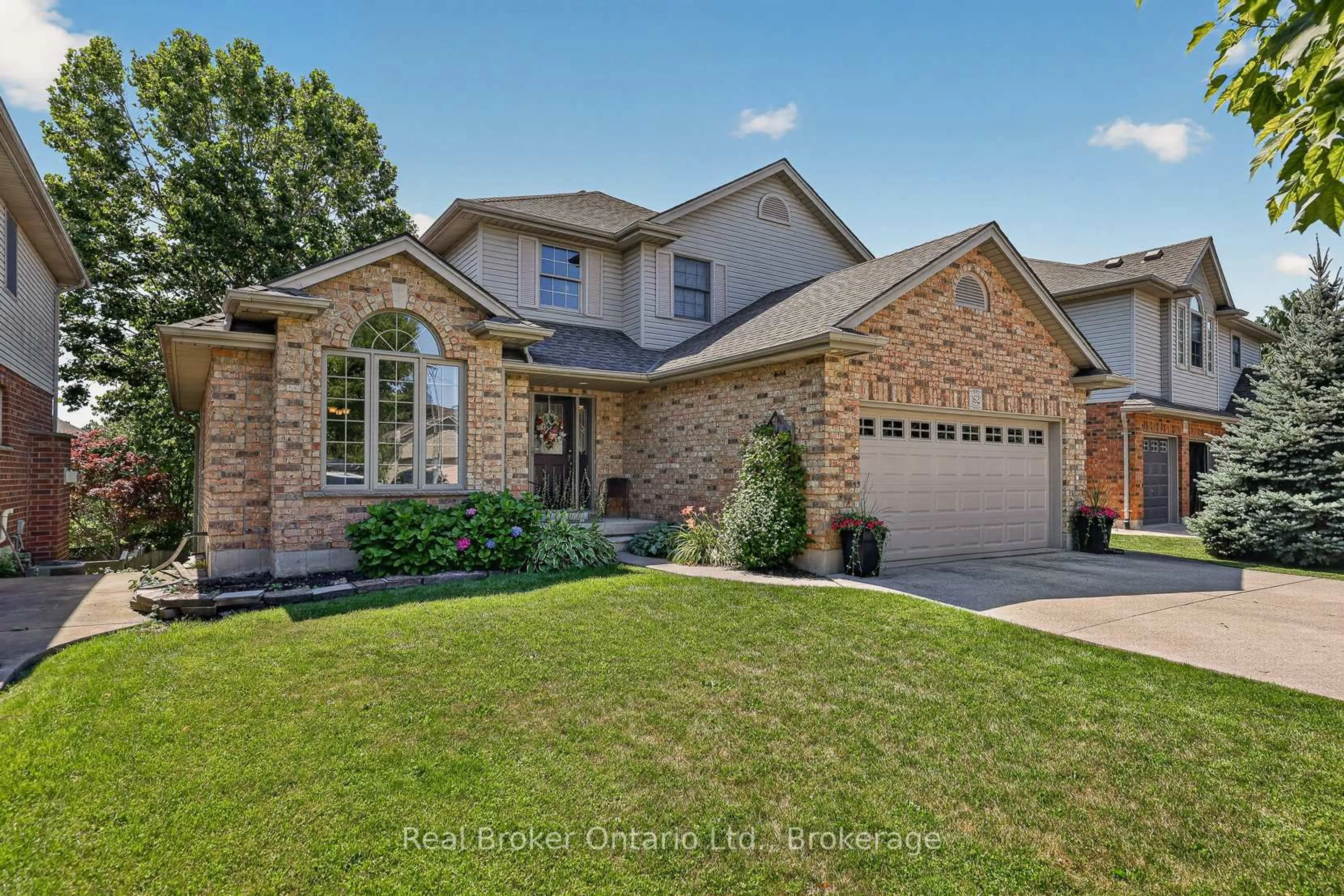 Home with brick exterior material, street for 162 Kingfisher Ave, Woodstock Ontario N4T 1T6