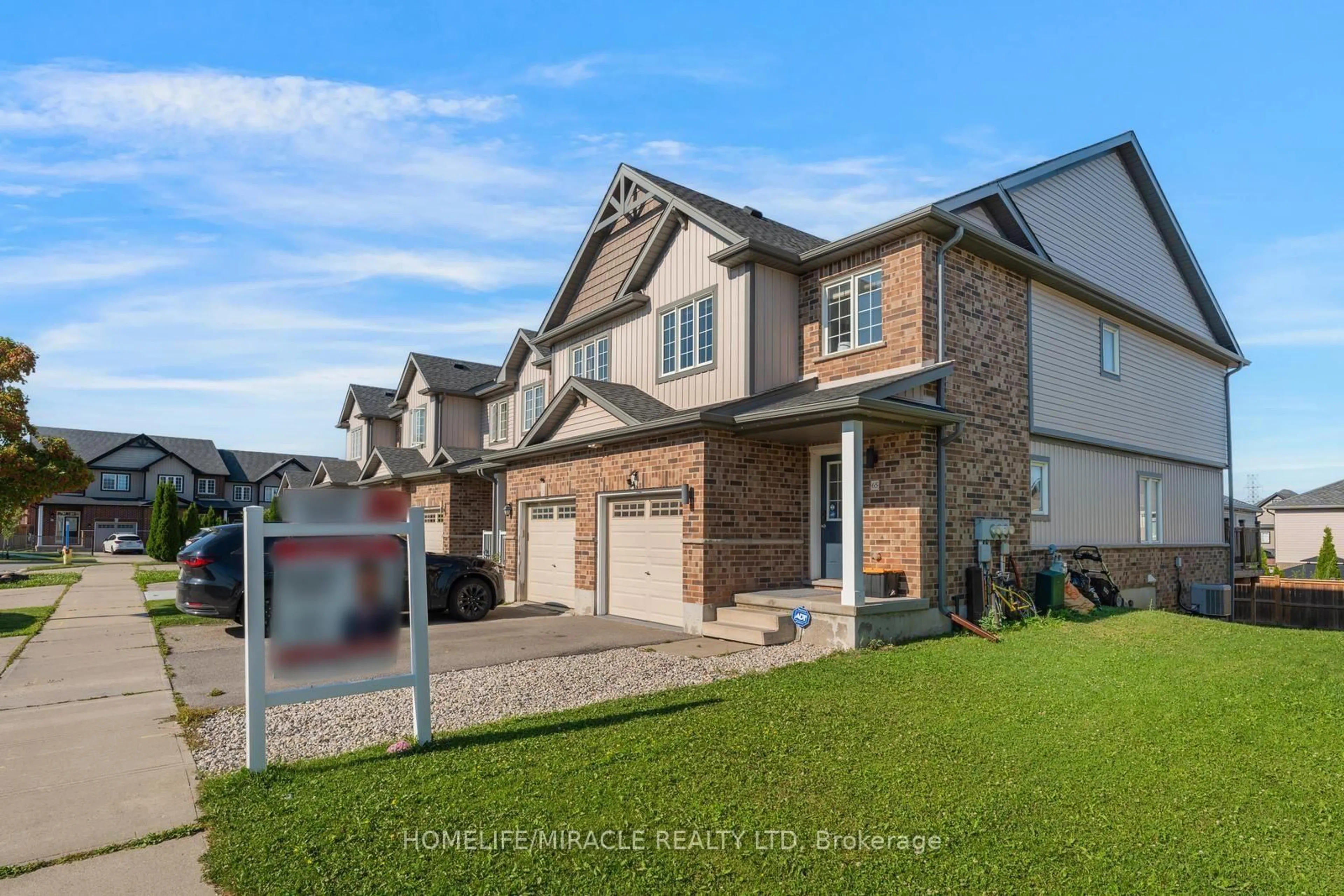 Home with brick exterior material, street for 65 Renfrew St, Kitchener Ontario N2R 0G5