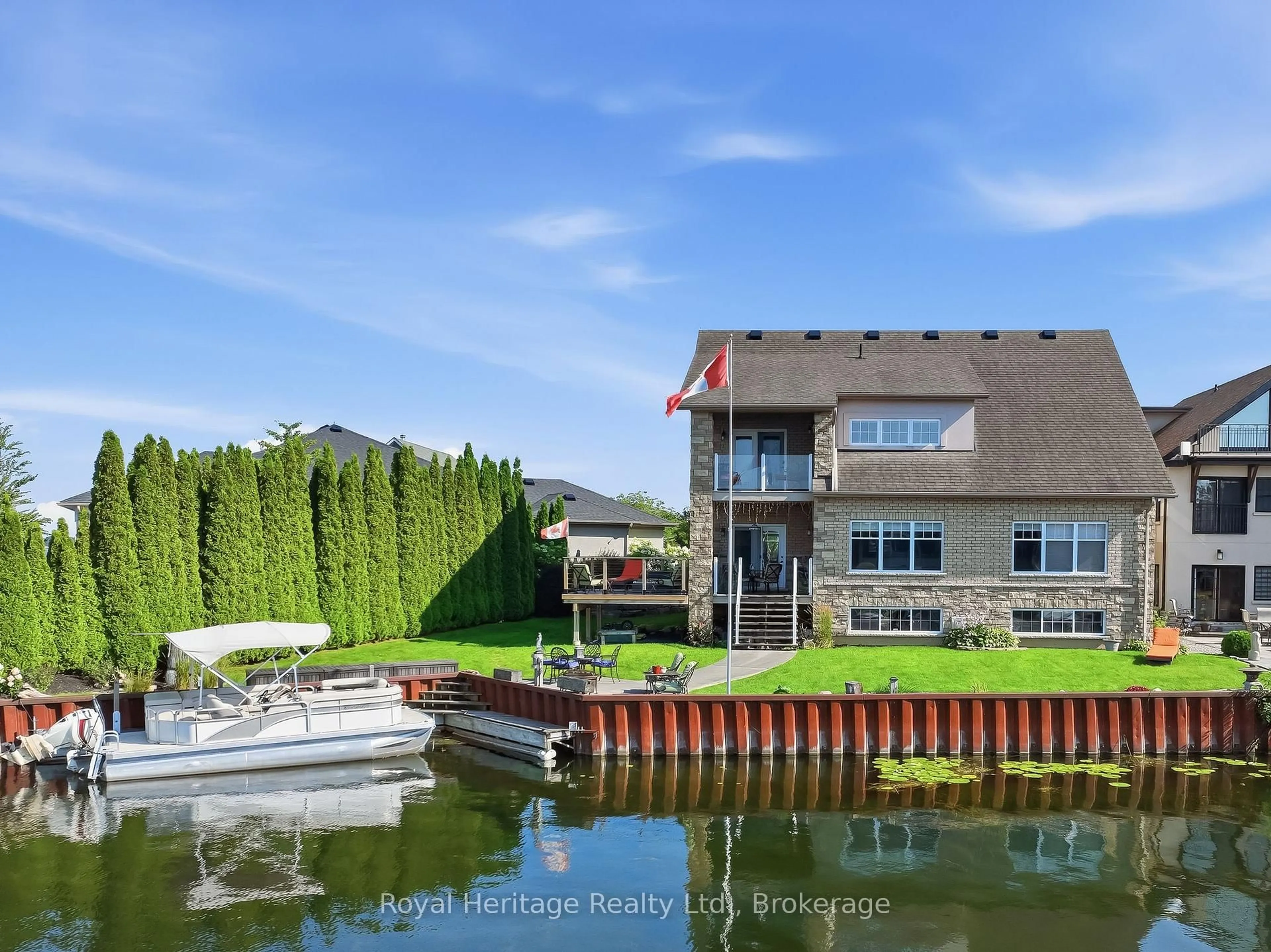 A pic from outside/outdoor area/front of a property/back of a property/a pic from drone, water/lake/river/ocean view for 32 Edgewater Dr, Brighton Ontario K0K 1H0