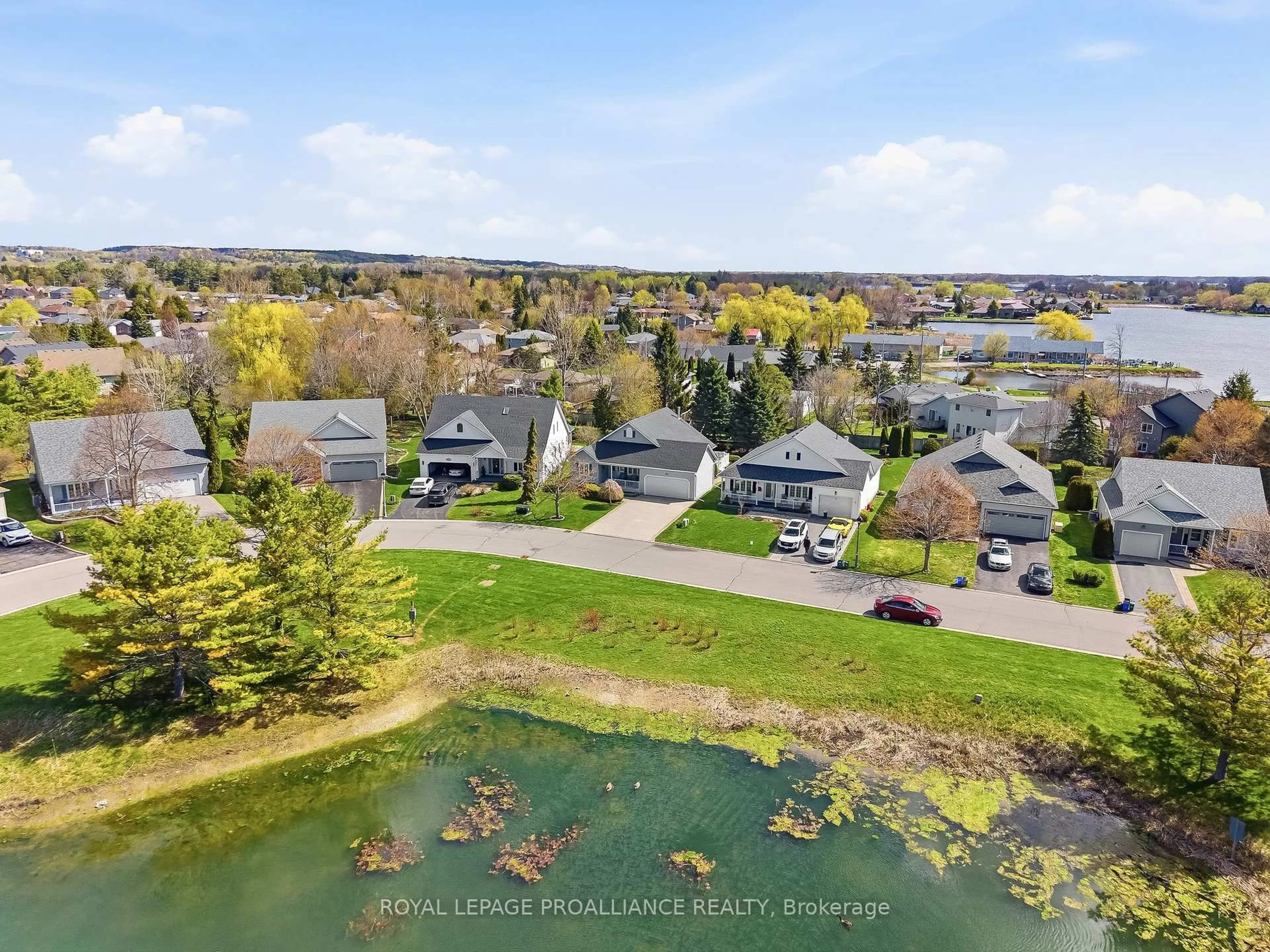 A pic from outside/outdoor area/front of a property/back of a property/a pic from drone, water/lake/river/ocean view for 8 Sandpiper Way, Brighton Ontario K0K 1H0