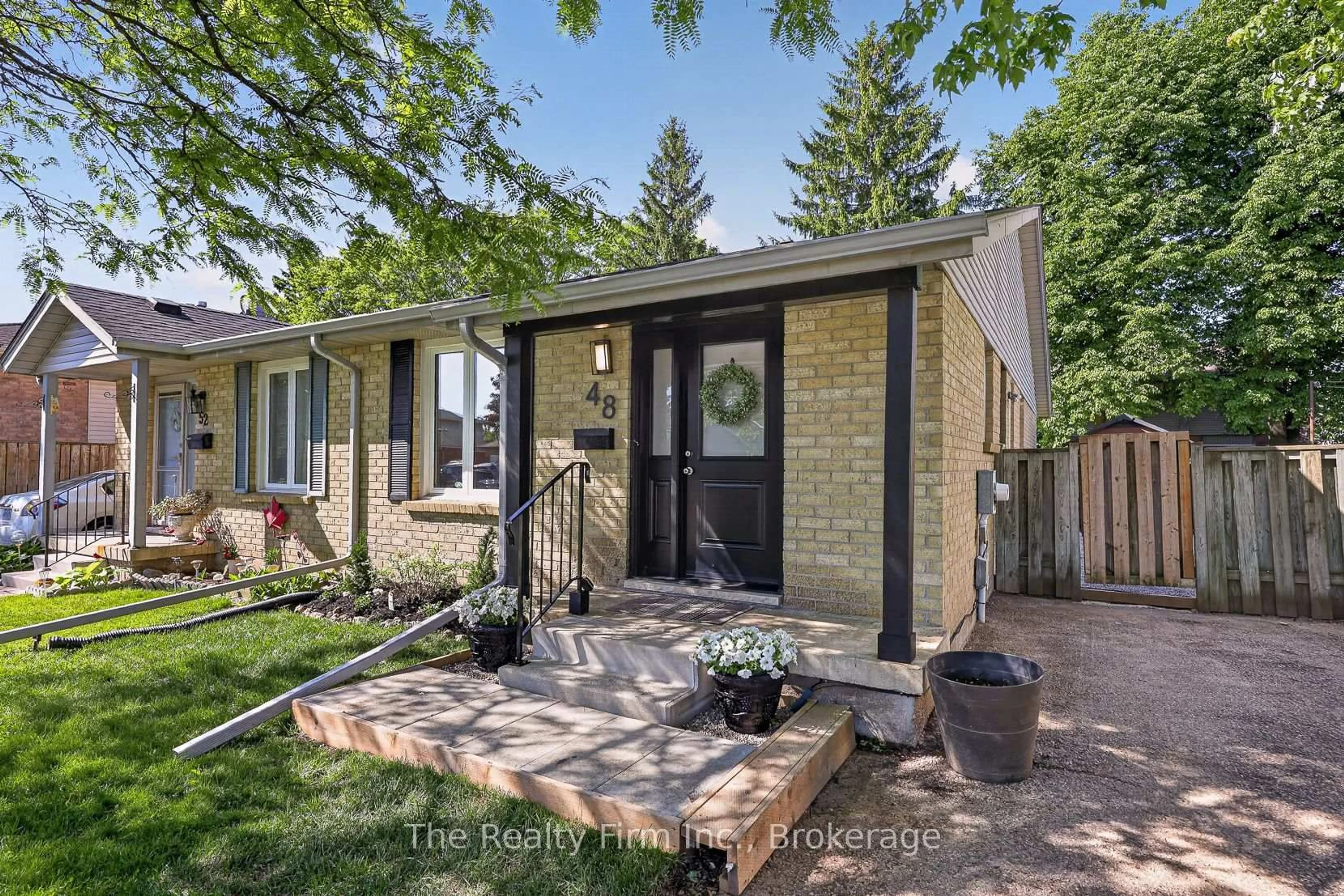 Home with brick exterior material, street for 48 Naskapi St, Woodstock Ontario N4T 1G6