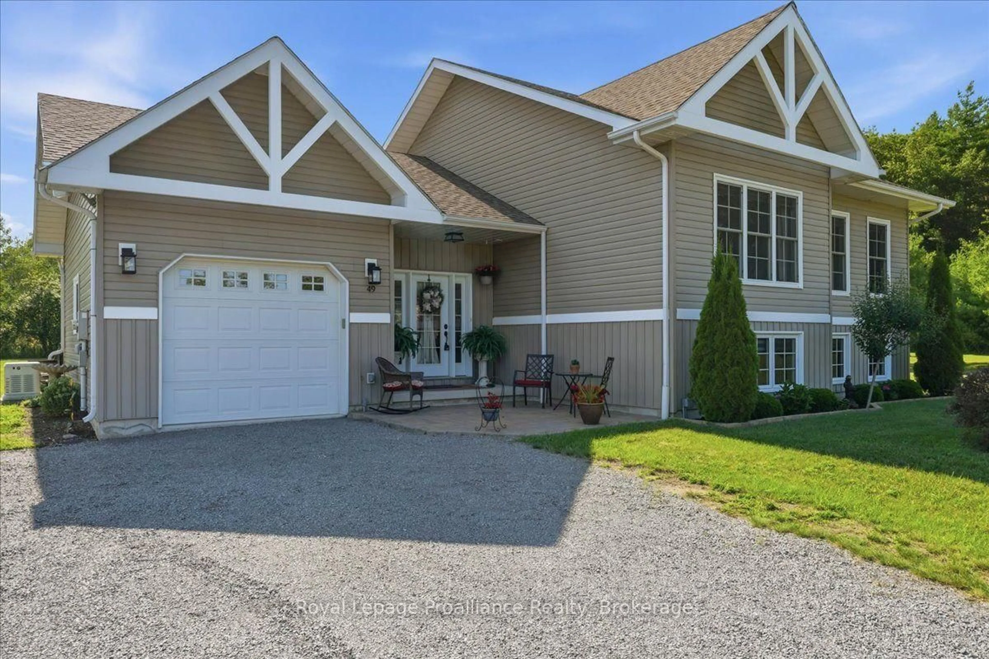 Home with vinyl exterior material, street for 49 Rapids Rd, Thomasburg Ontario K0K 3H0