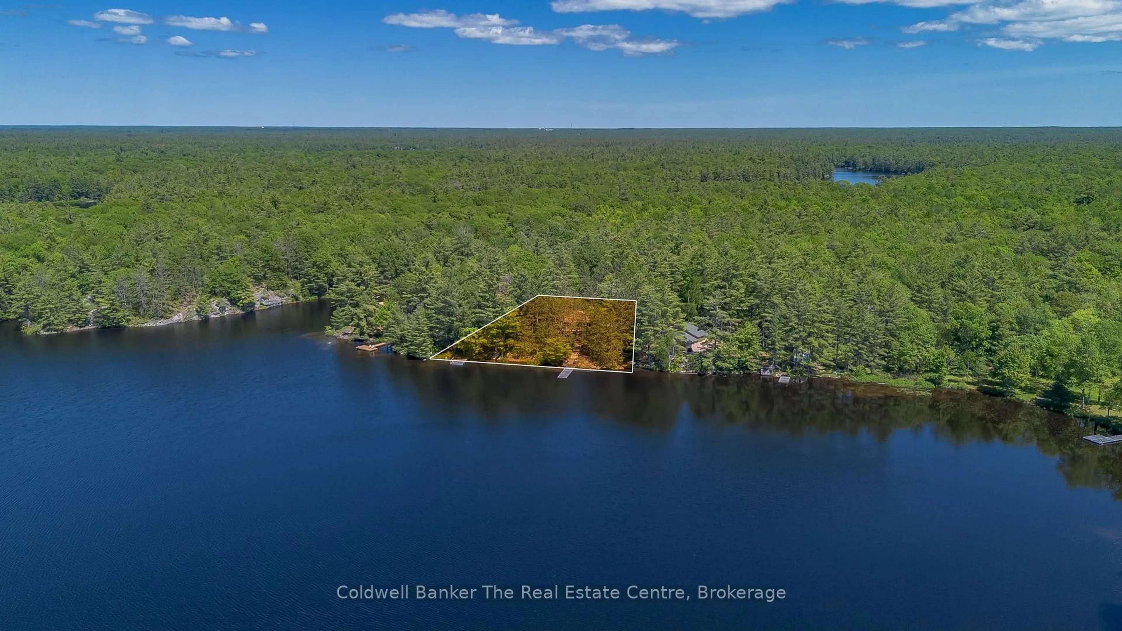 A pic from outside/outdoor area/front of a property/back of a property/a pic from drone, water/lake/river/ocean view for 1077 Misty Lane, Gravenhurst Ontario P0E 1G0