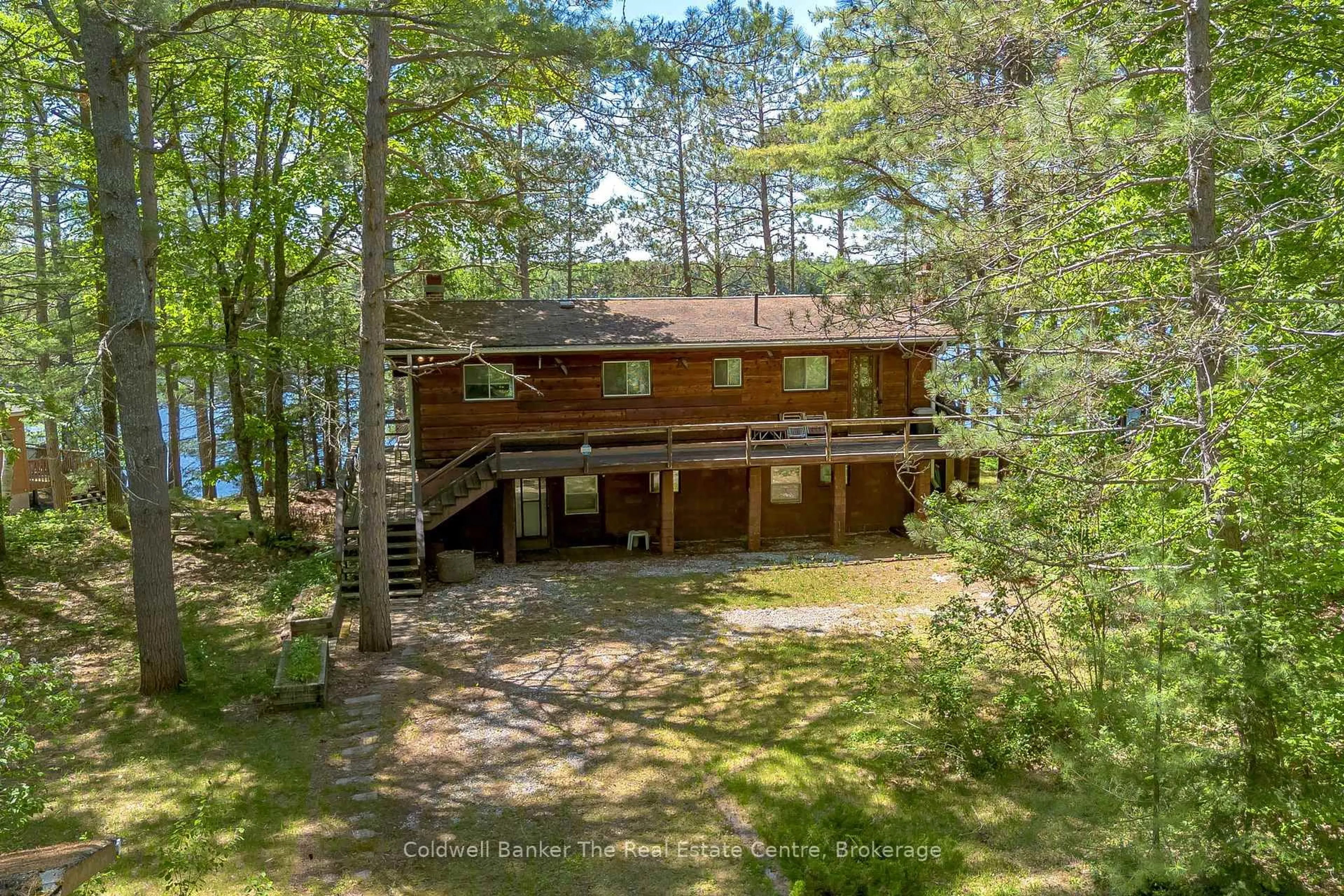 A pic from outside/outdoor area/front of a property/back of a property/a pic from drone, water/lake/river/ocean view for 1077 Misty Lane, Gravenhurst Ontario P0E 1G0