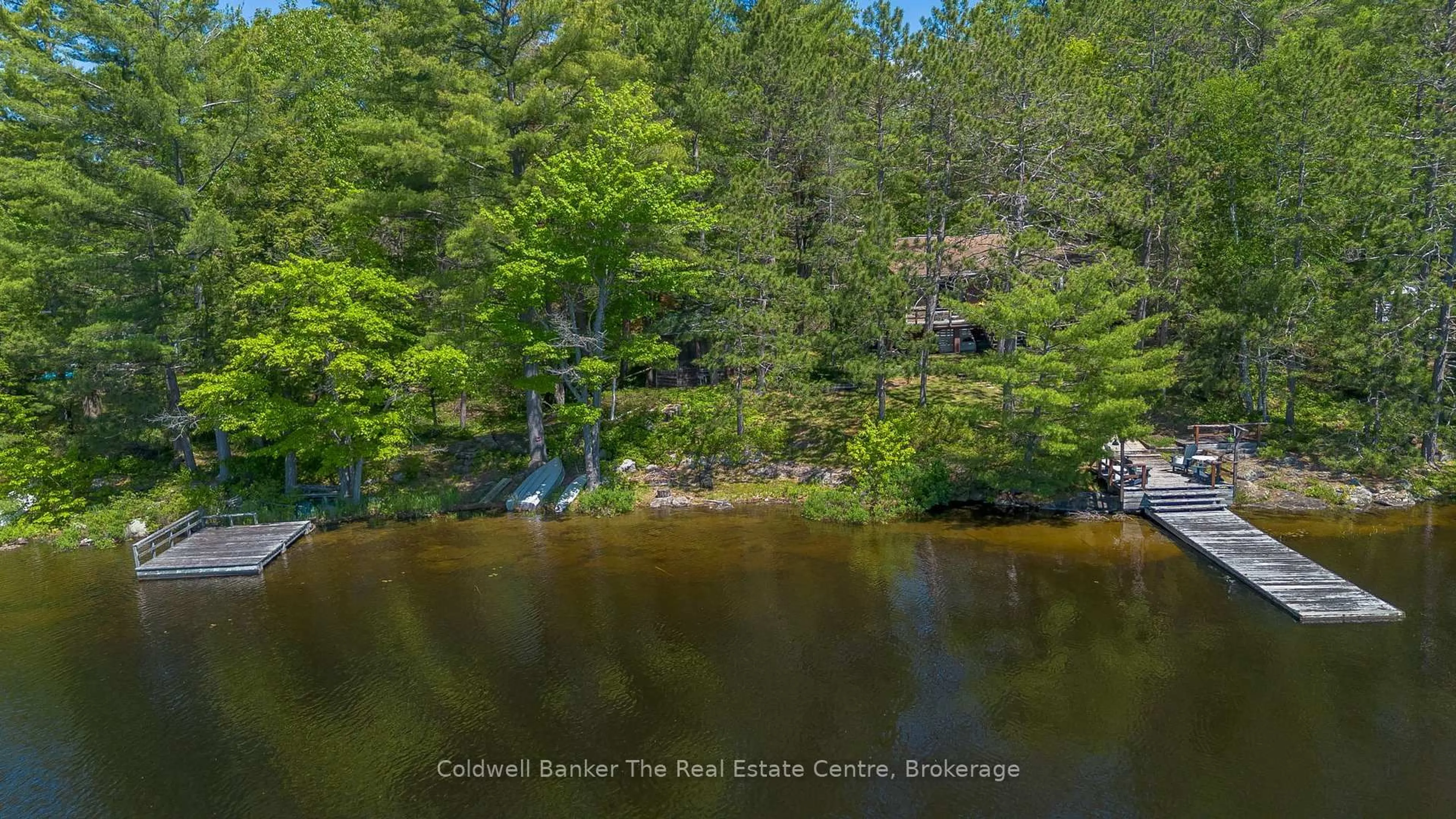 A pic from outside/outdoor area/front of a property/back of a property/a pic from drone, water/lake/river/ocean view for 1077 Misty Lane, Gravenhurst Ontario P0E 1G0