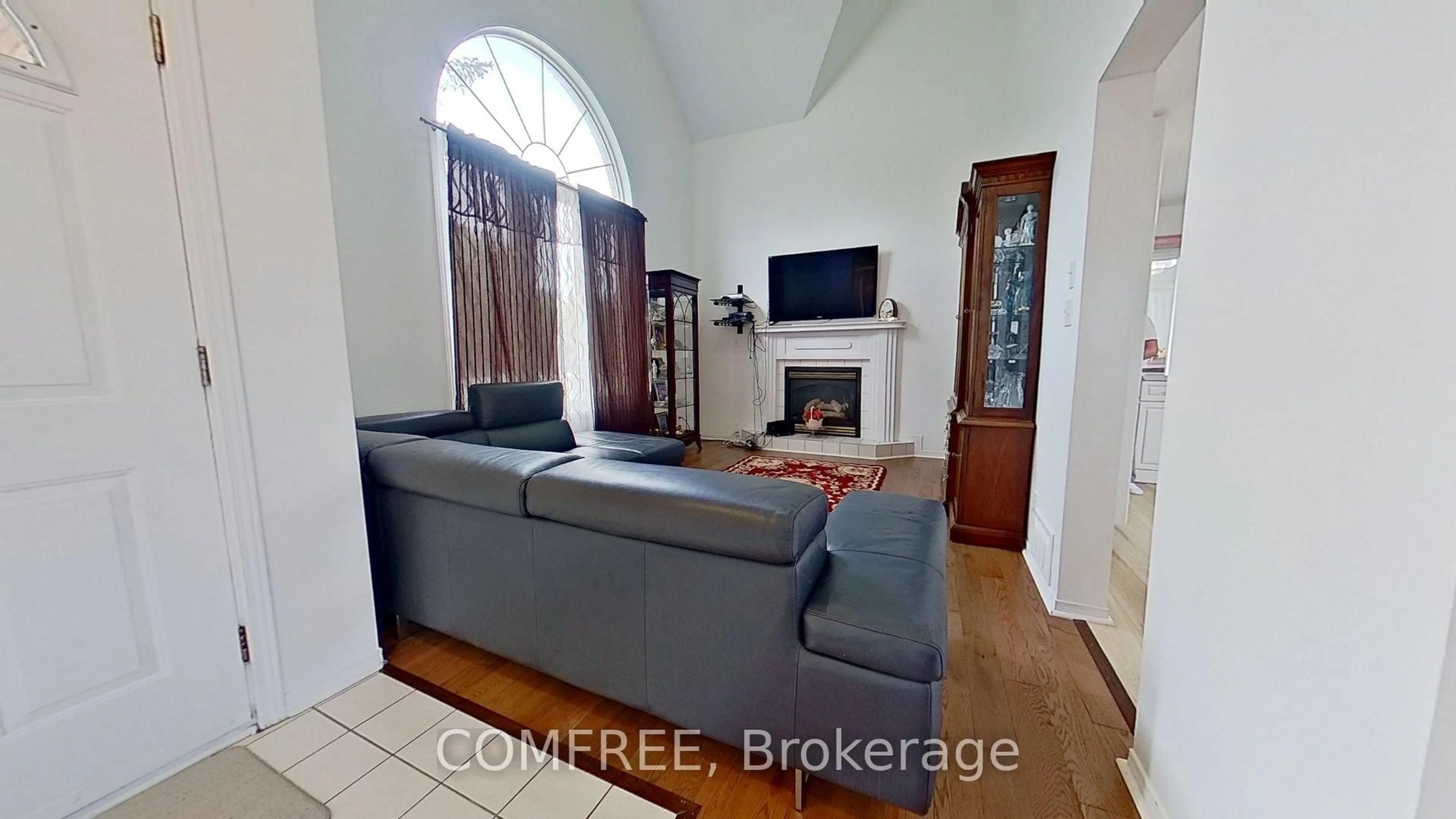 Living room with furniture, ceramic/tile floor for 1226 Matheson Rd, Ottawa Ontario K1J 1A7