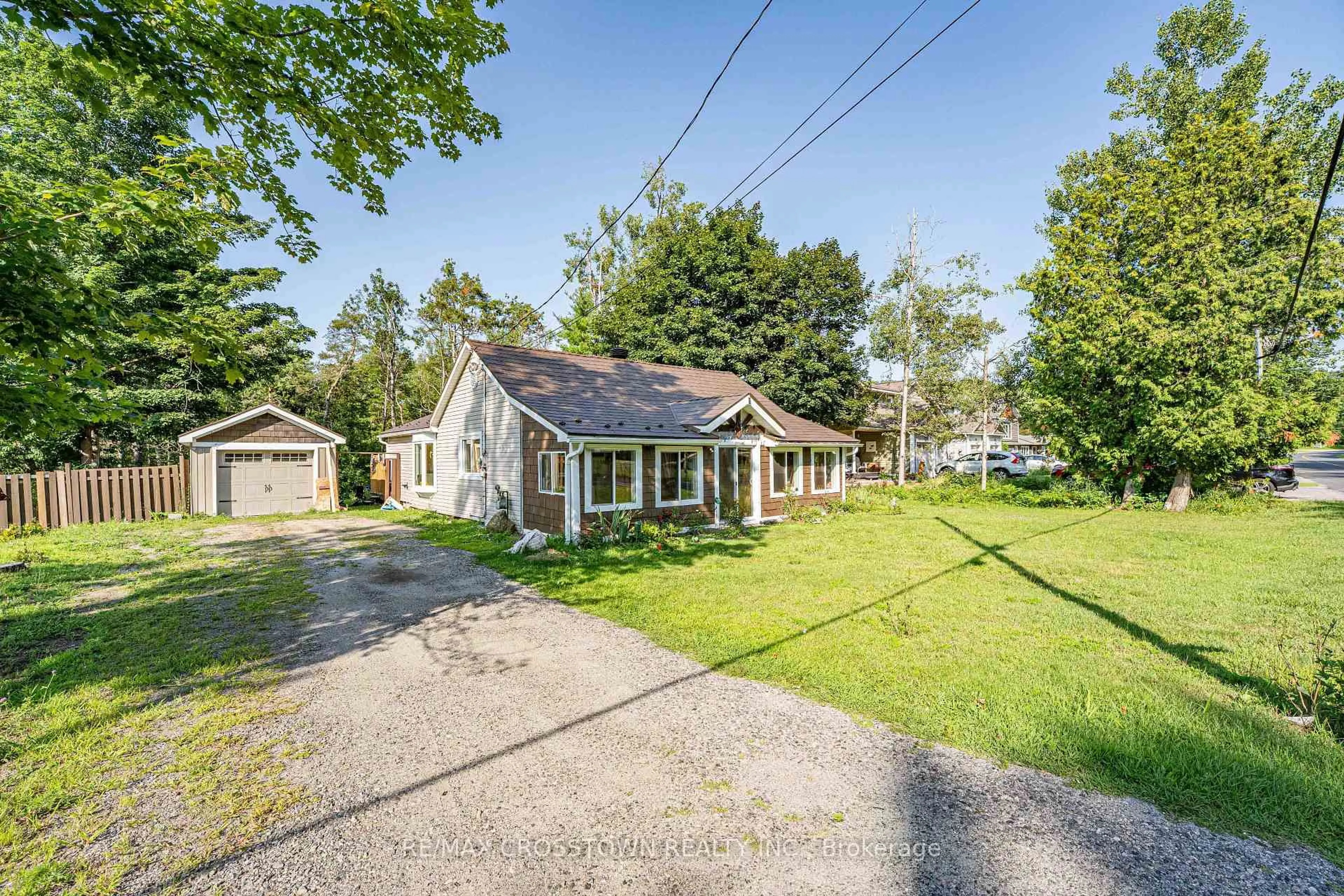 A pic from outside/outdoor area/front of a property/back of a property/a pic from drone, street for 1430 Muskoka Rd, Gravenhurst Ontario P1P 1R7