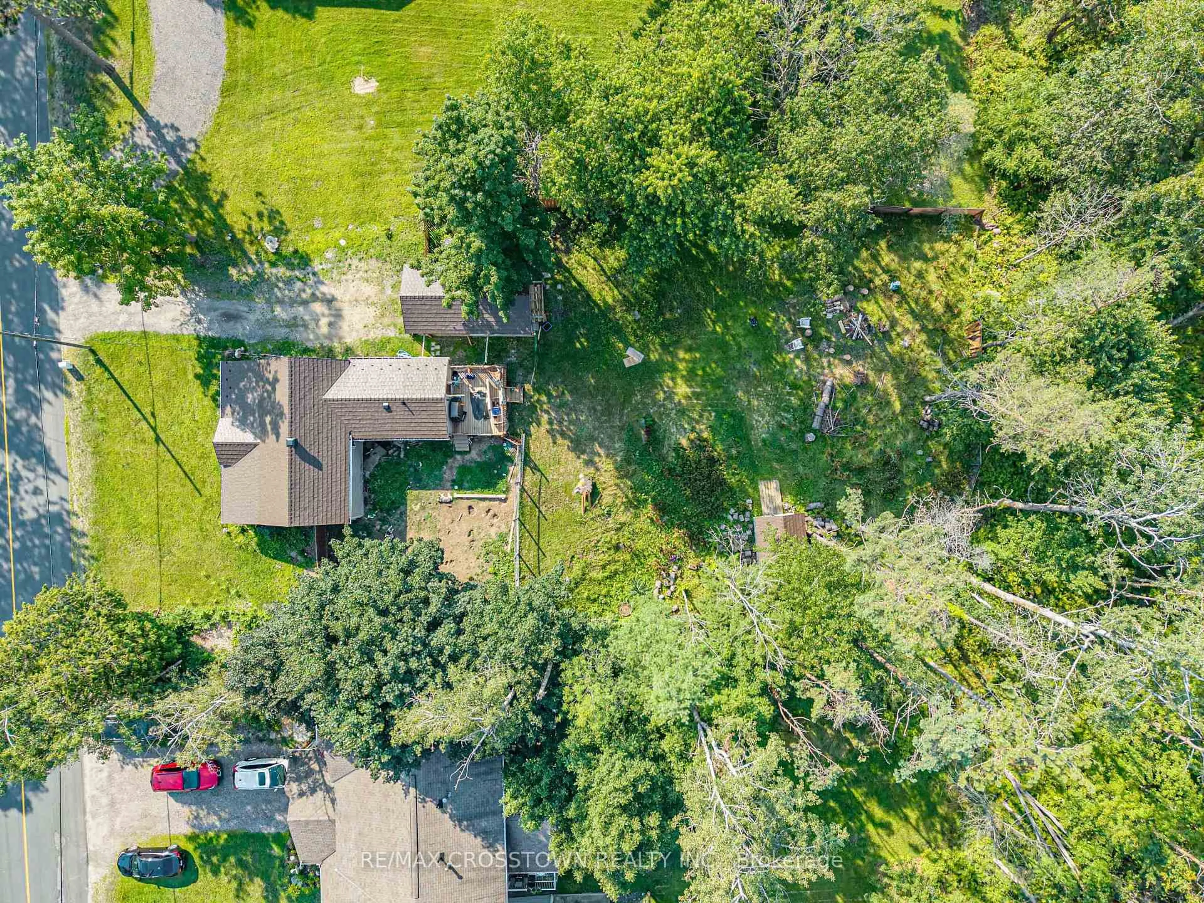 A pic from outside/outdoor area/front of a property/back of a property/a pic from drone, forest/trees view for 1430 Muskoka Rd, Gravenhurst Ontario P1P 1R7