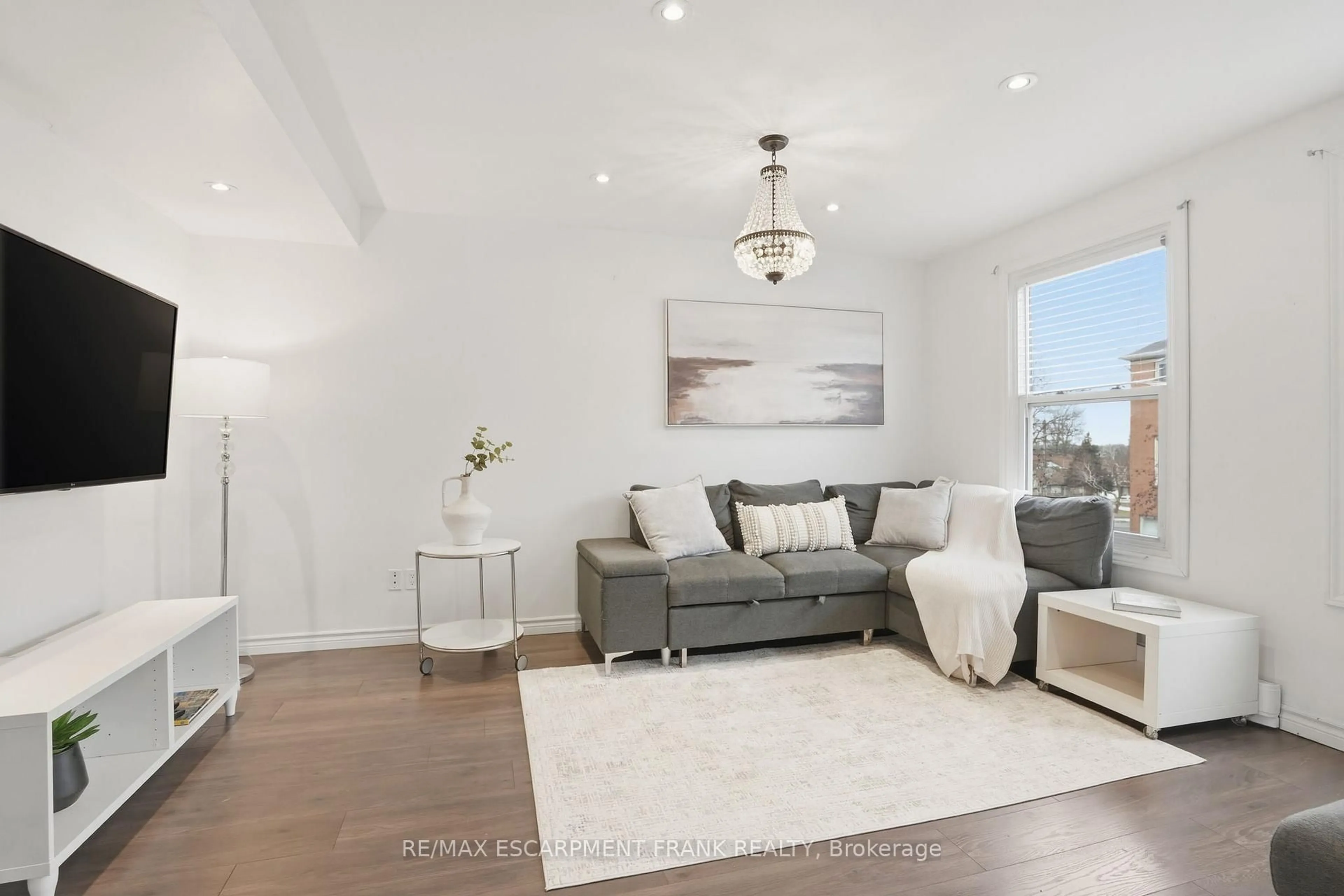 Living room with furniture, unknown for 1255 Upper Gage Ave #15, Hamilton Ontario L8W 3C7