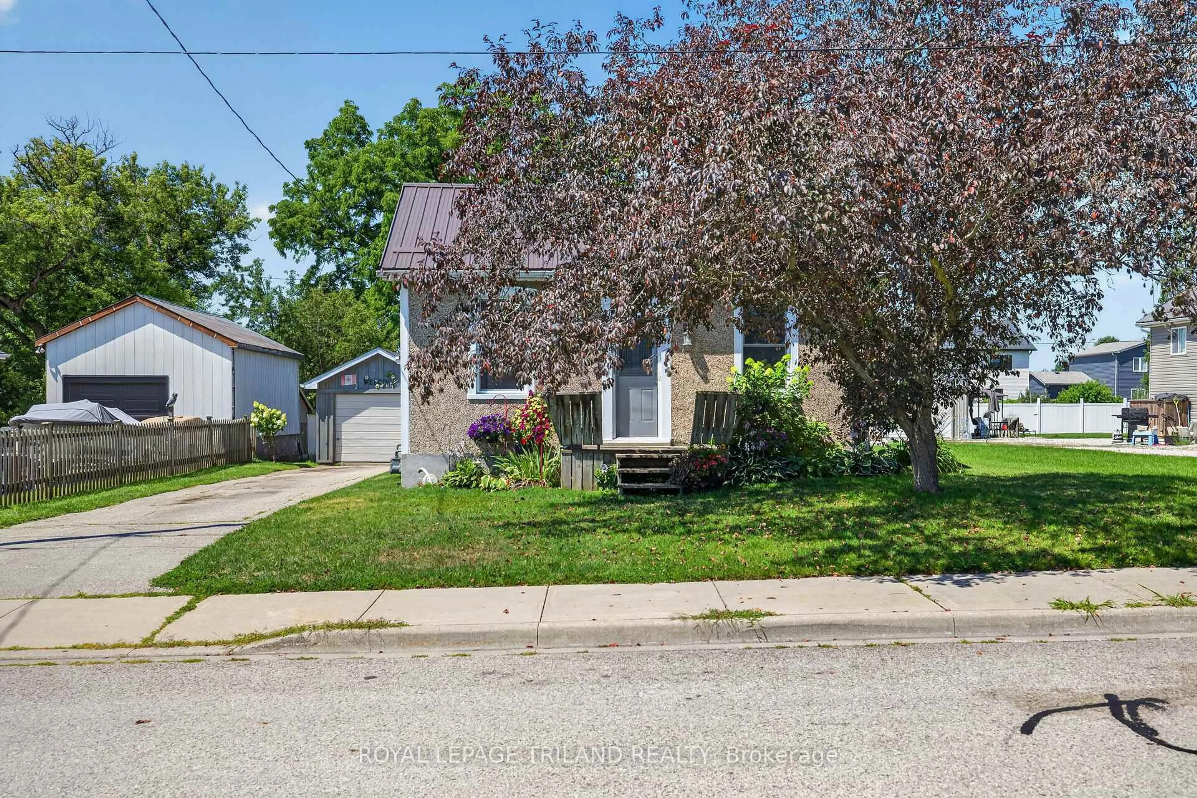 A pic from outside/outdoor area/front of a property/back of a property/a pic from drone, street for 244 West St, Central Elgin Ontario N0L 1B0