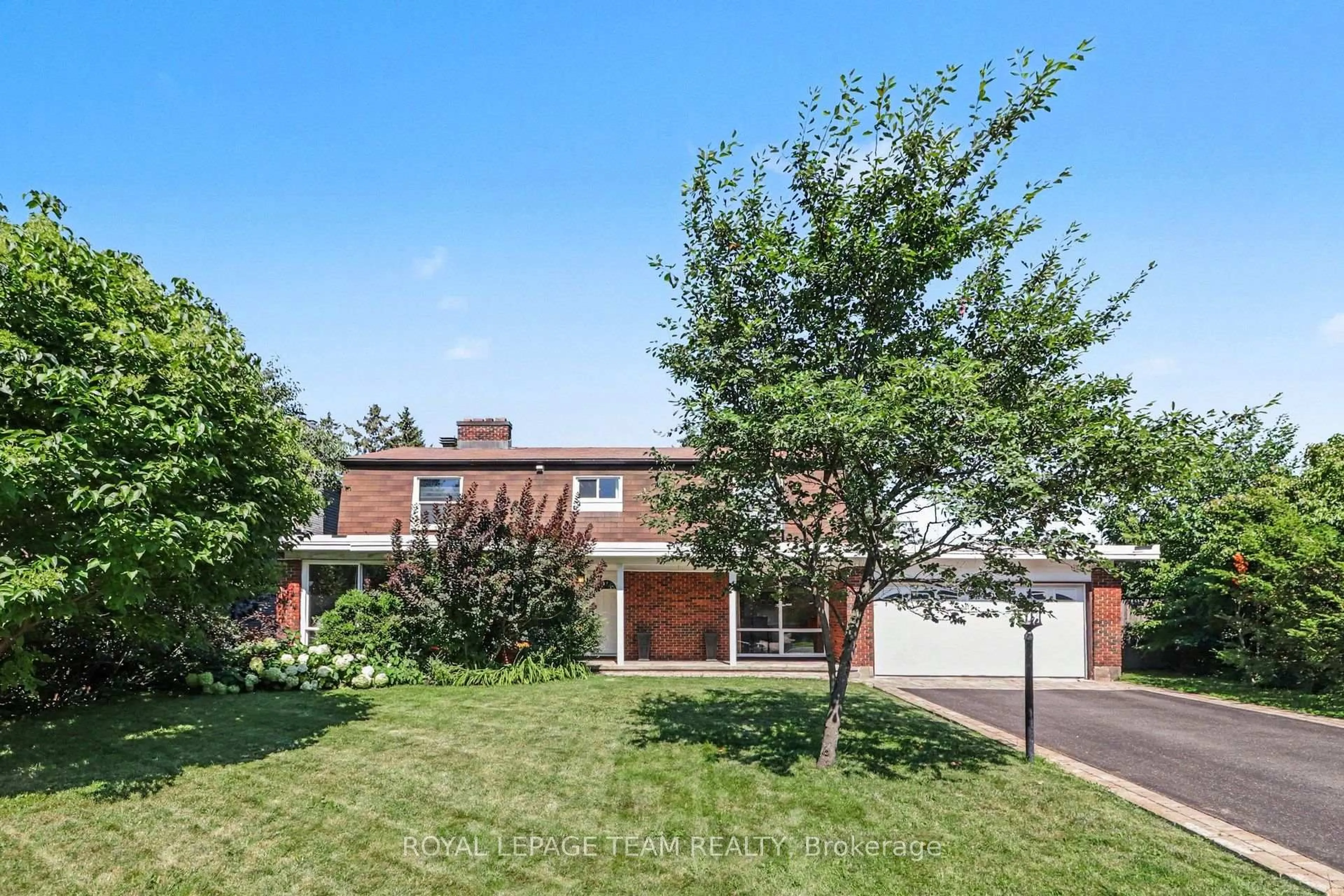 Home with brick exterior material, street for 23 Sioux Cres, Ottawa Ontario K2H 7E4